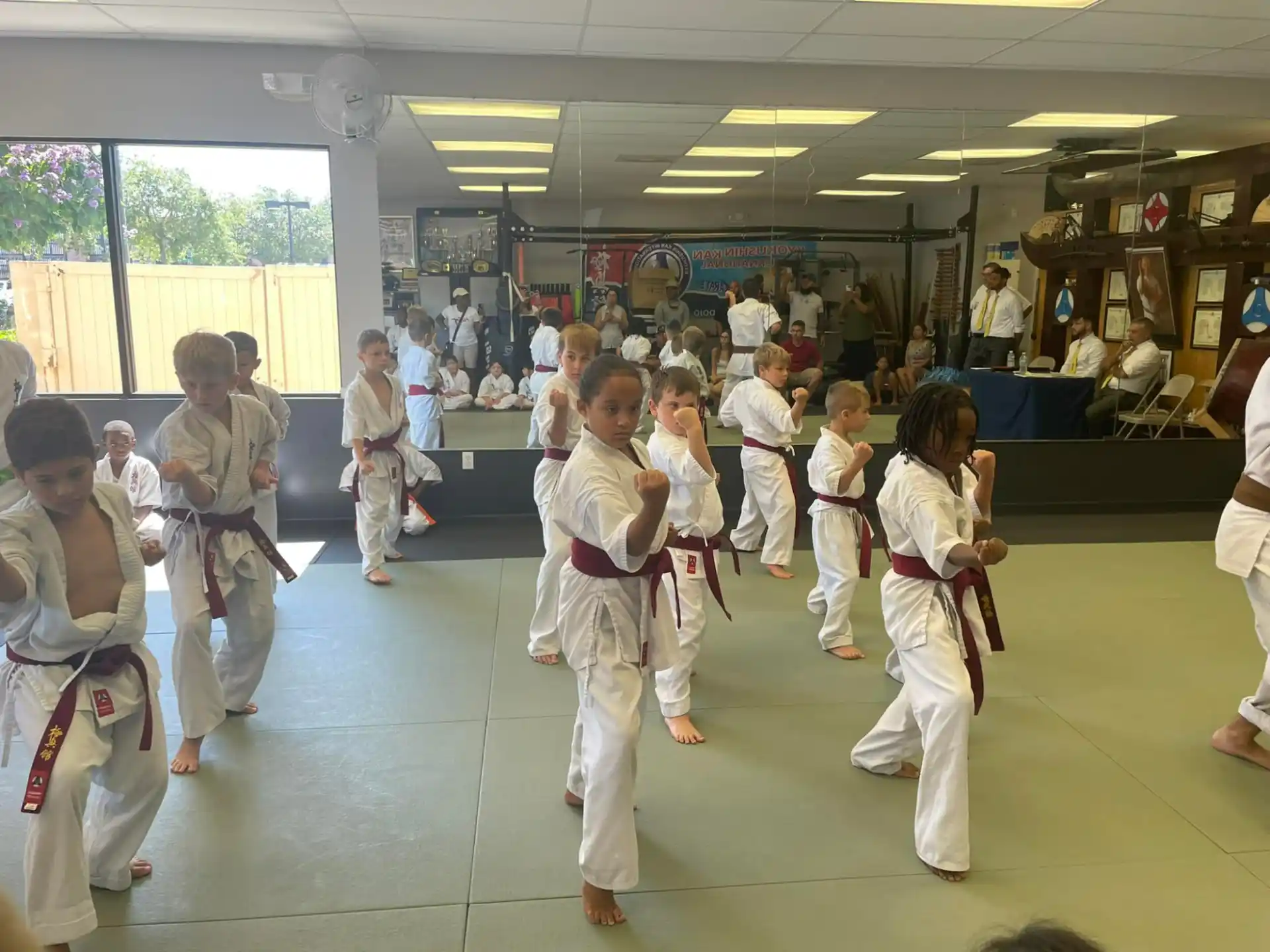 a group of people in karate uniforms