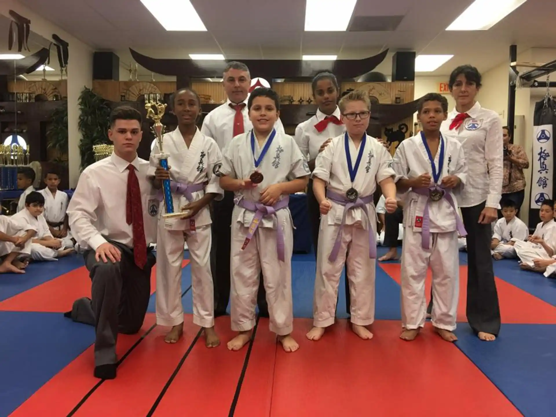 a group of people wearing karate uniforms