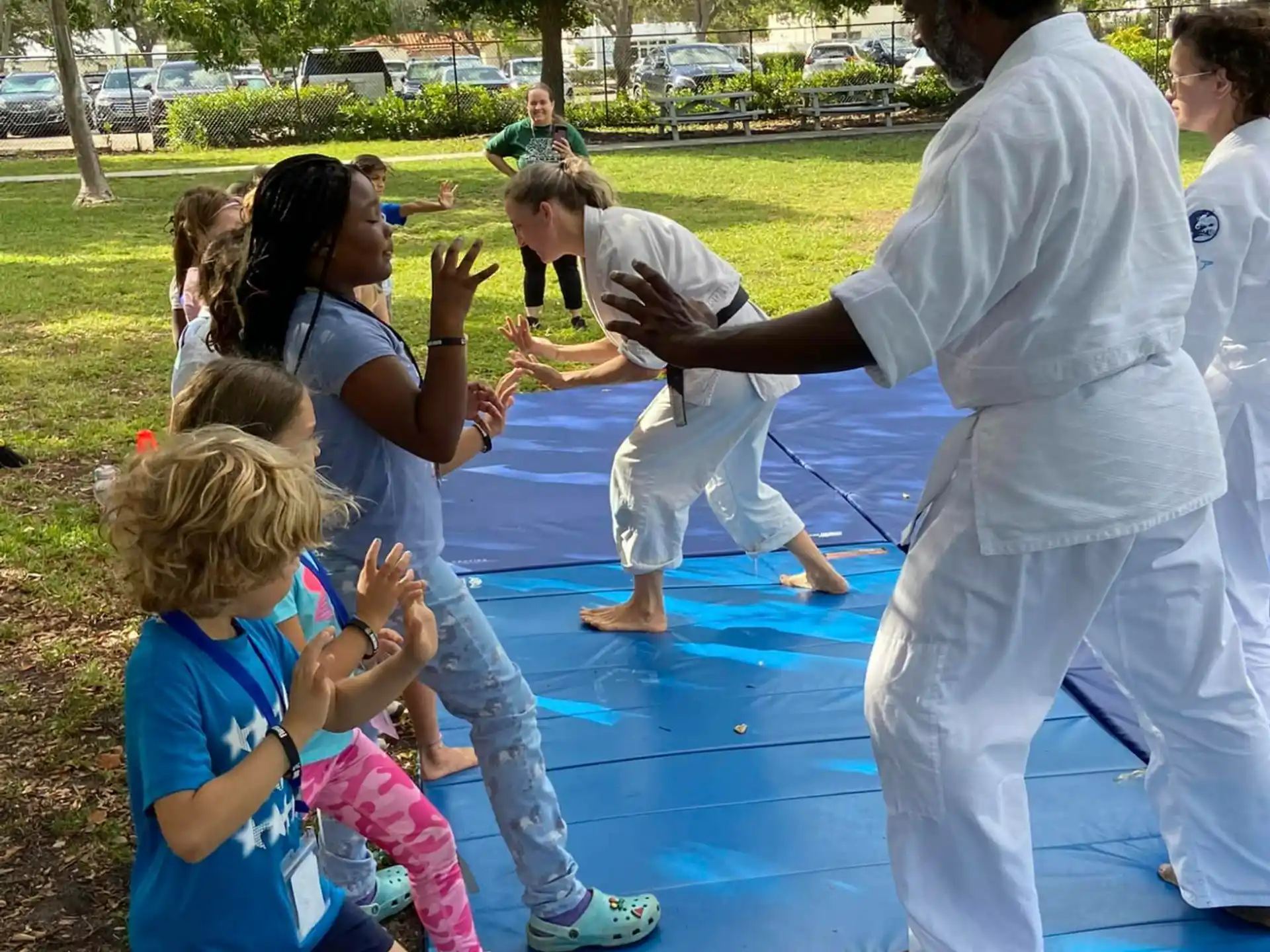 a group of people practicing martial arts
