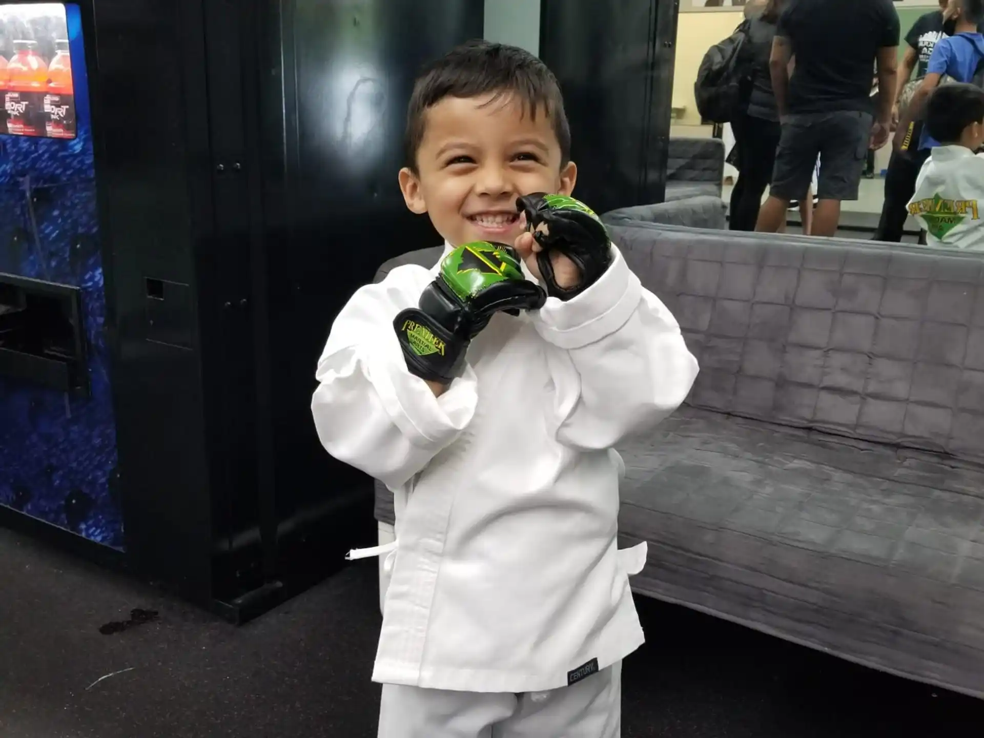 a boy holding a toy
