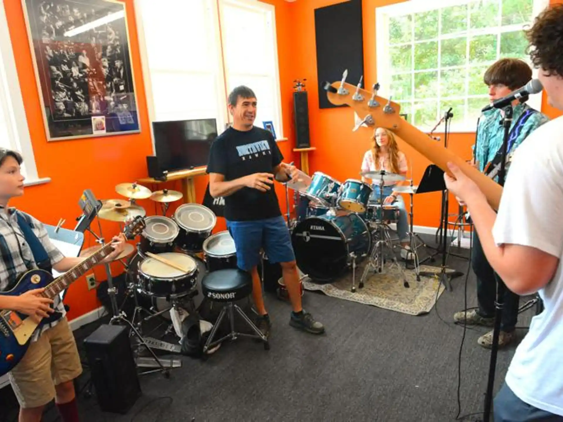 a group of people playing instruments