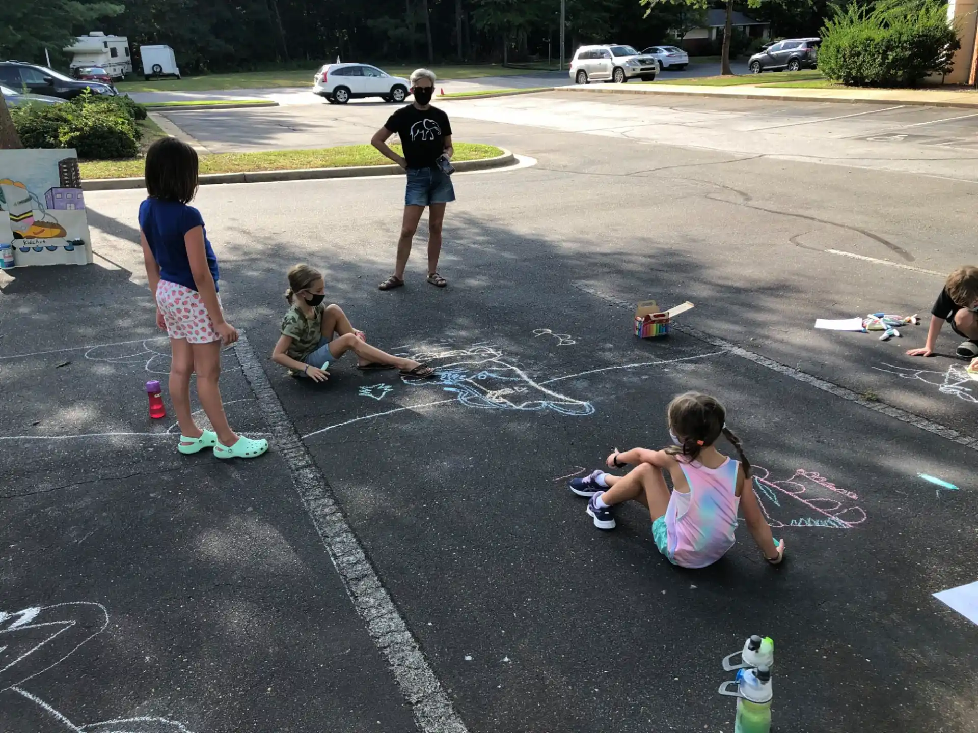a group of people playing in a parking lot