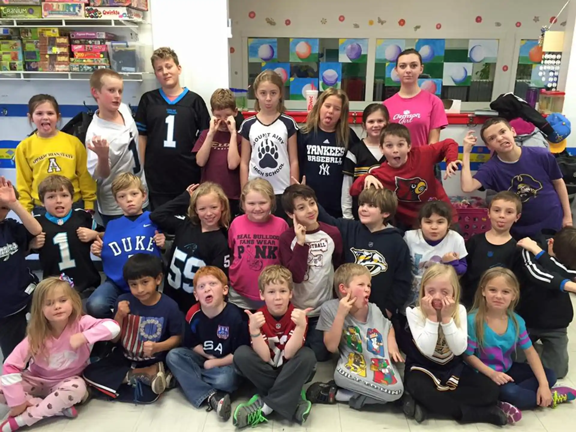 a group of children posing for a photo