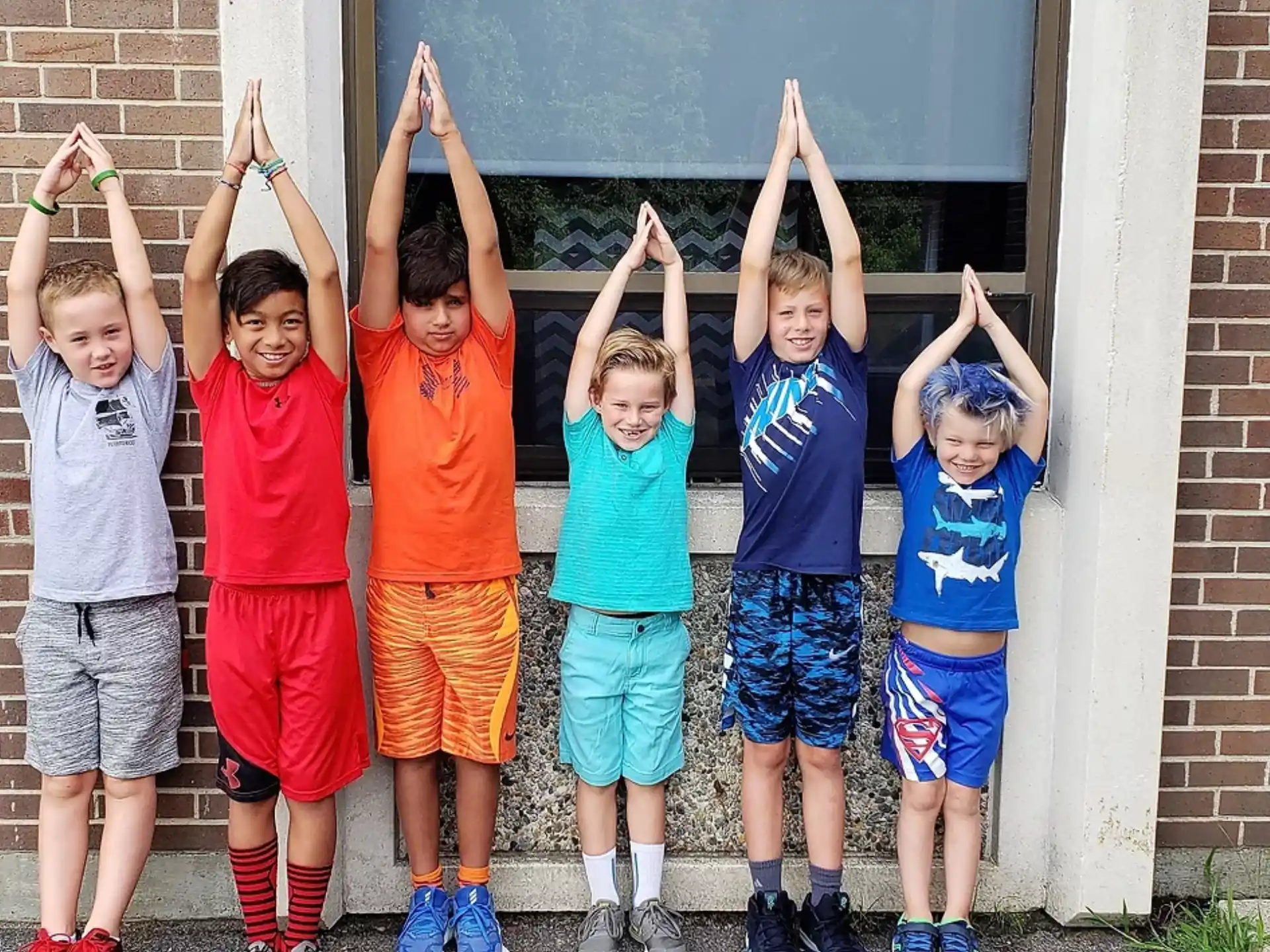 a group of boys posing for a picture