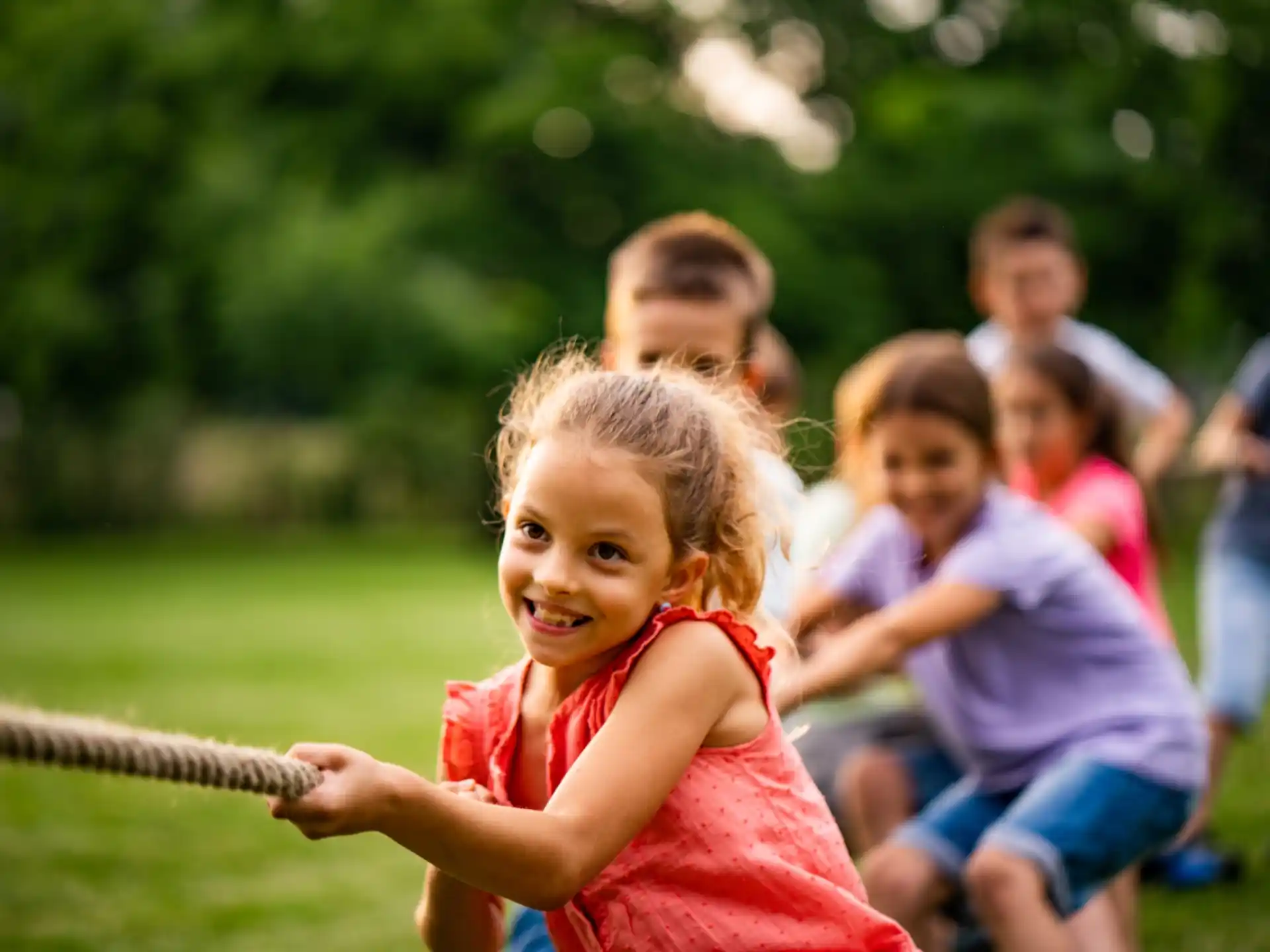 a young girl playing baseball