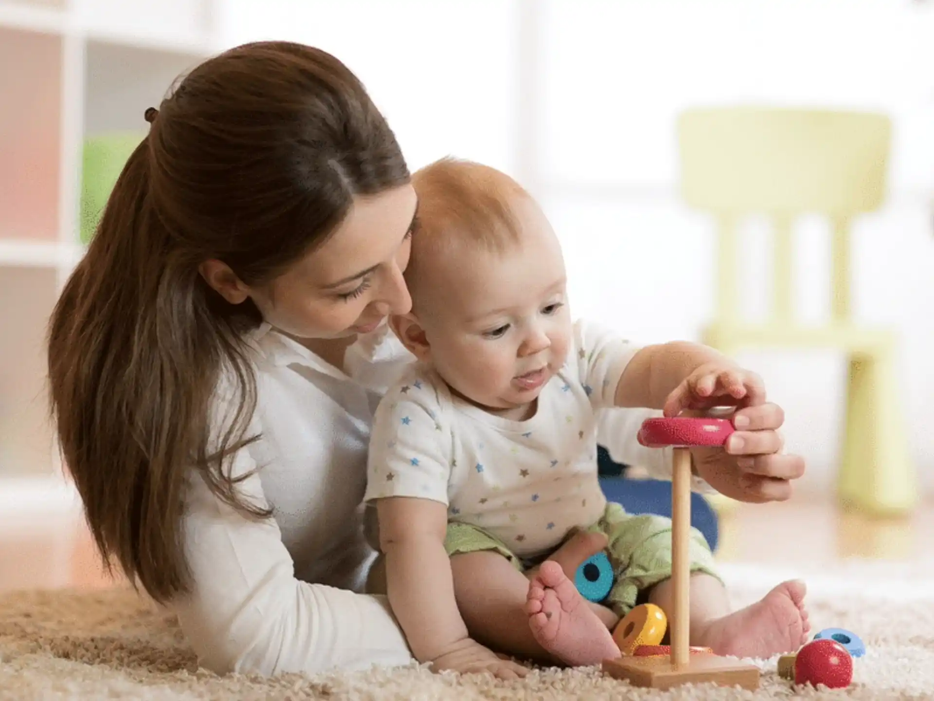 a person holding a baby