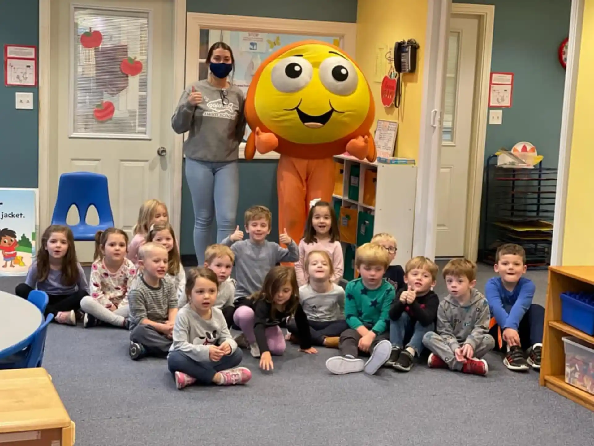 a group of children posing for a photo