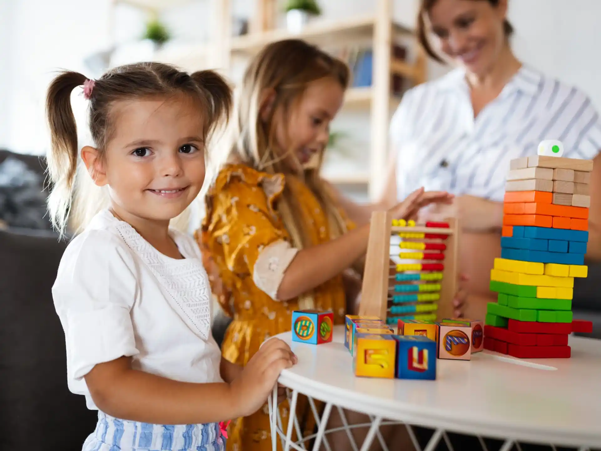a group of children playing with toys