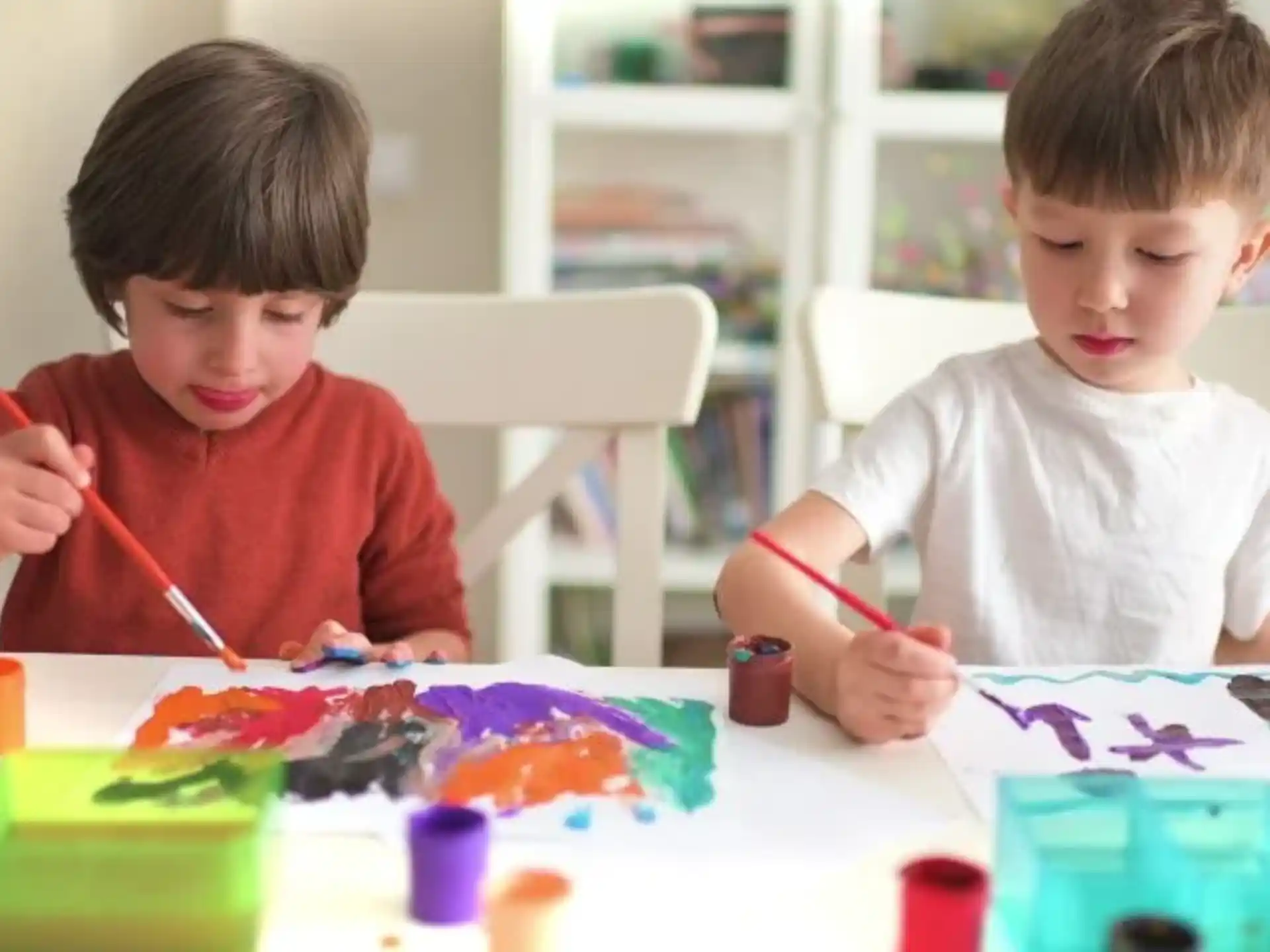 a couple of kids painting