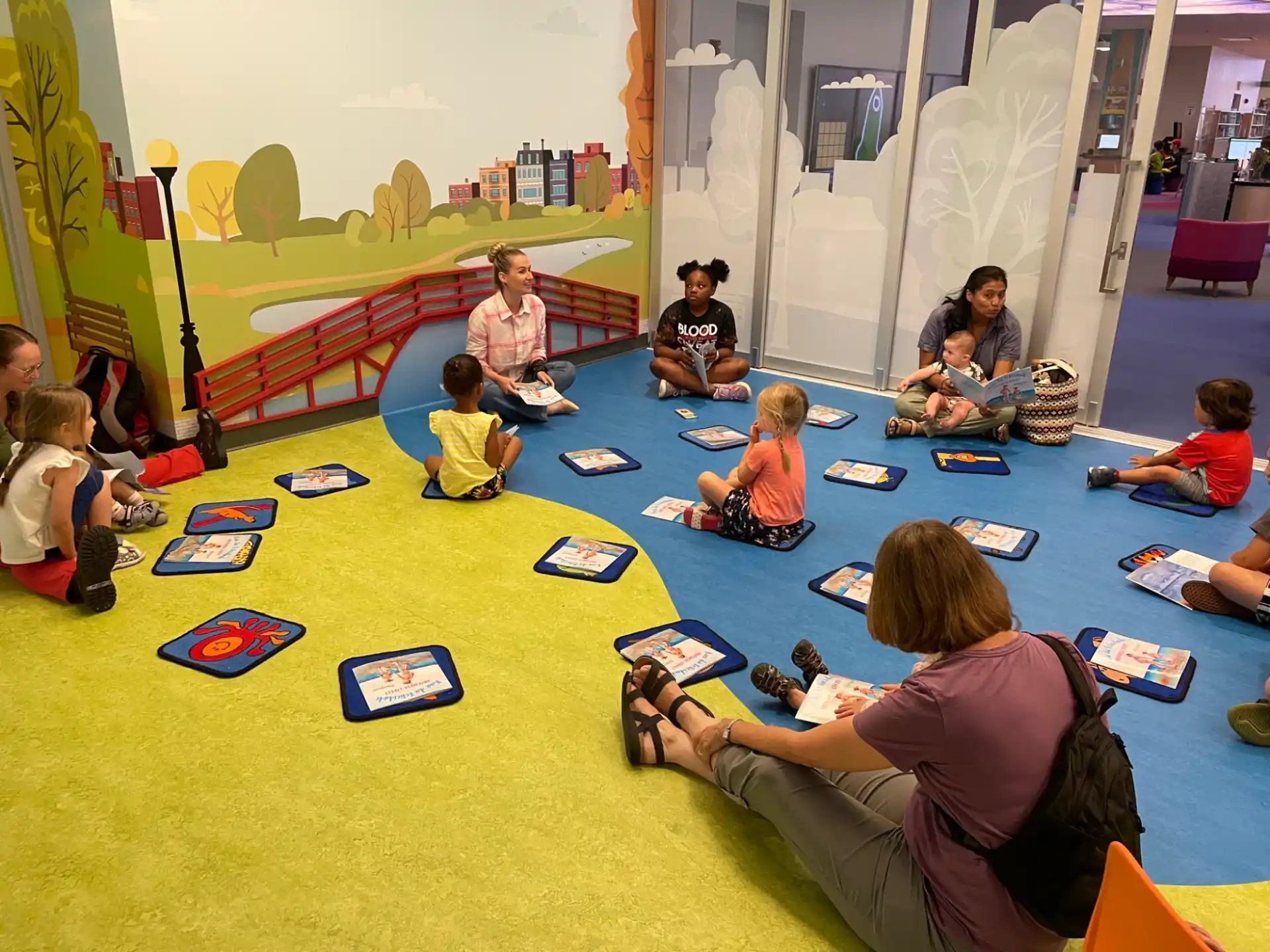 a group of people sitting on the floor