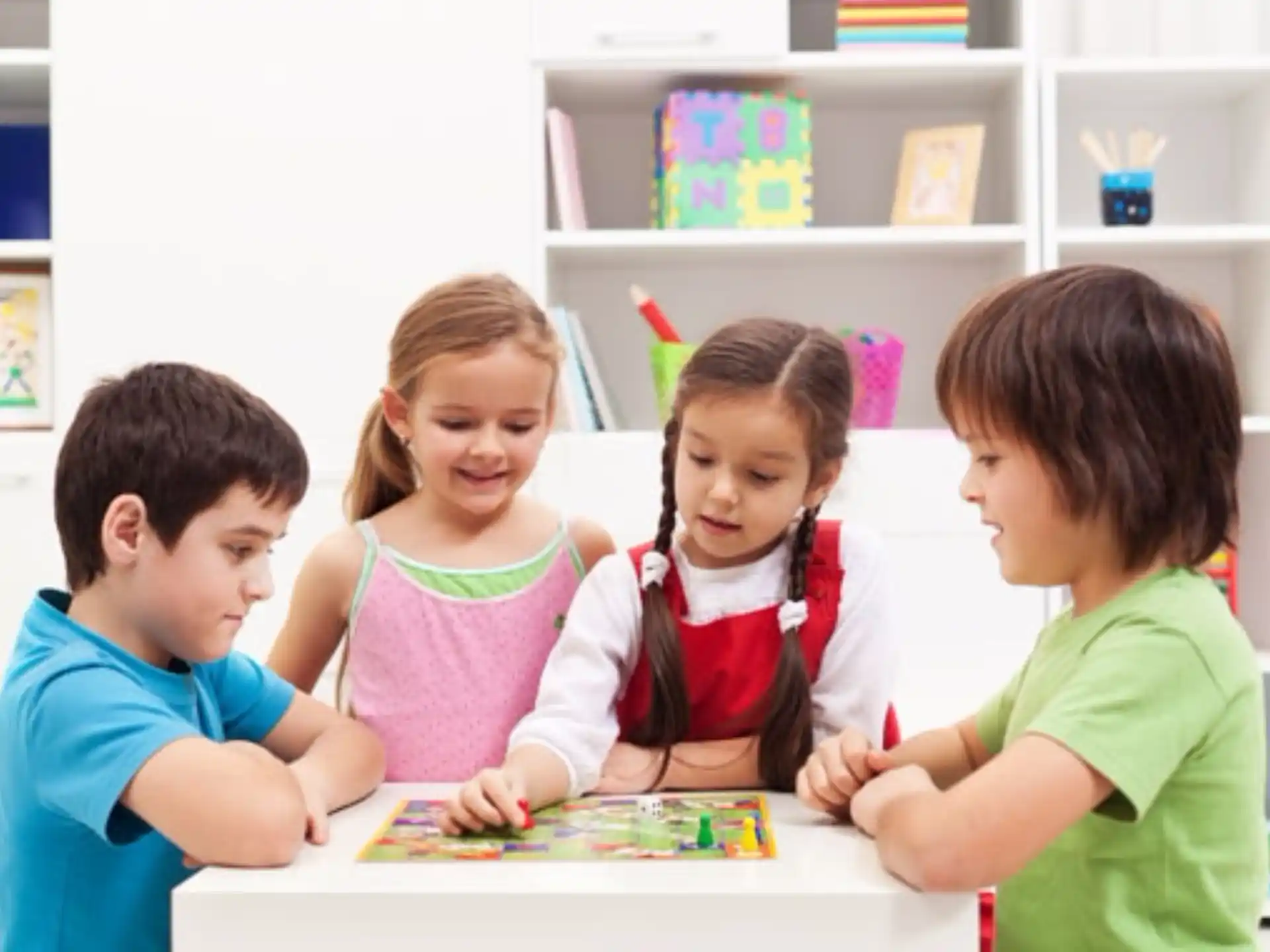 a group of children playing a board game