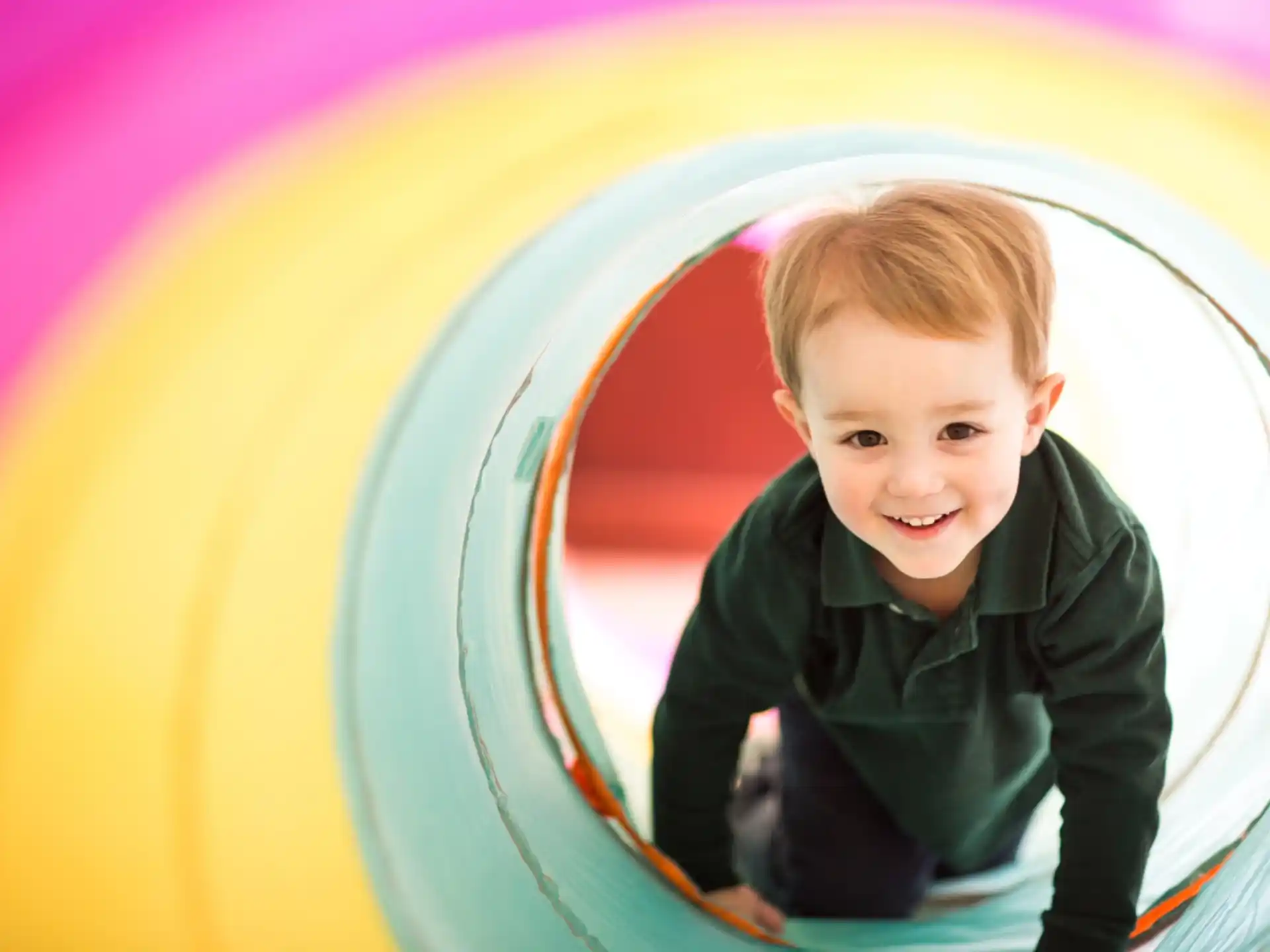 a boy in a tunnel