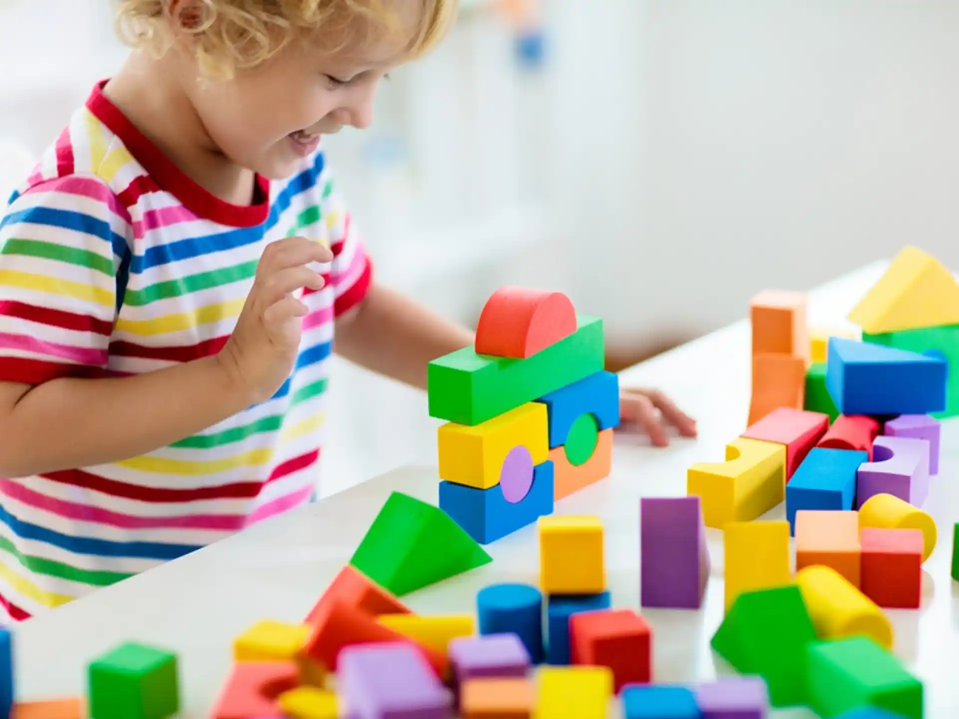 a child playing with blocks