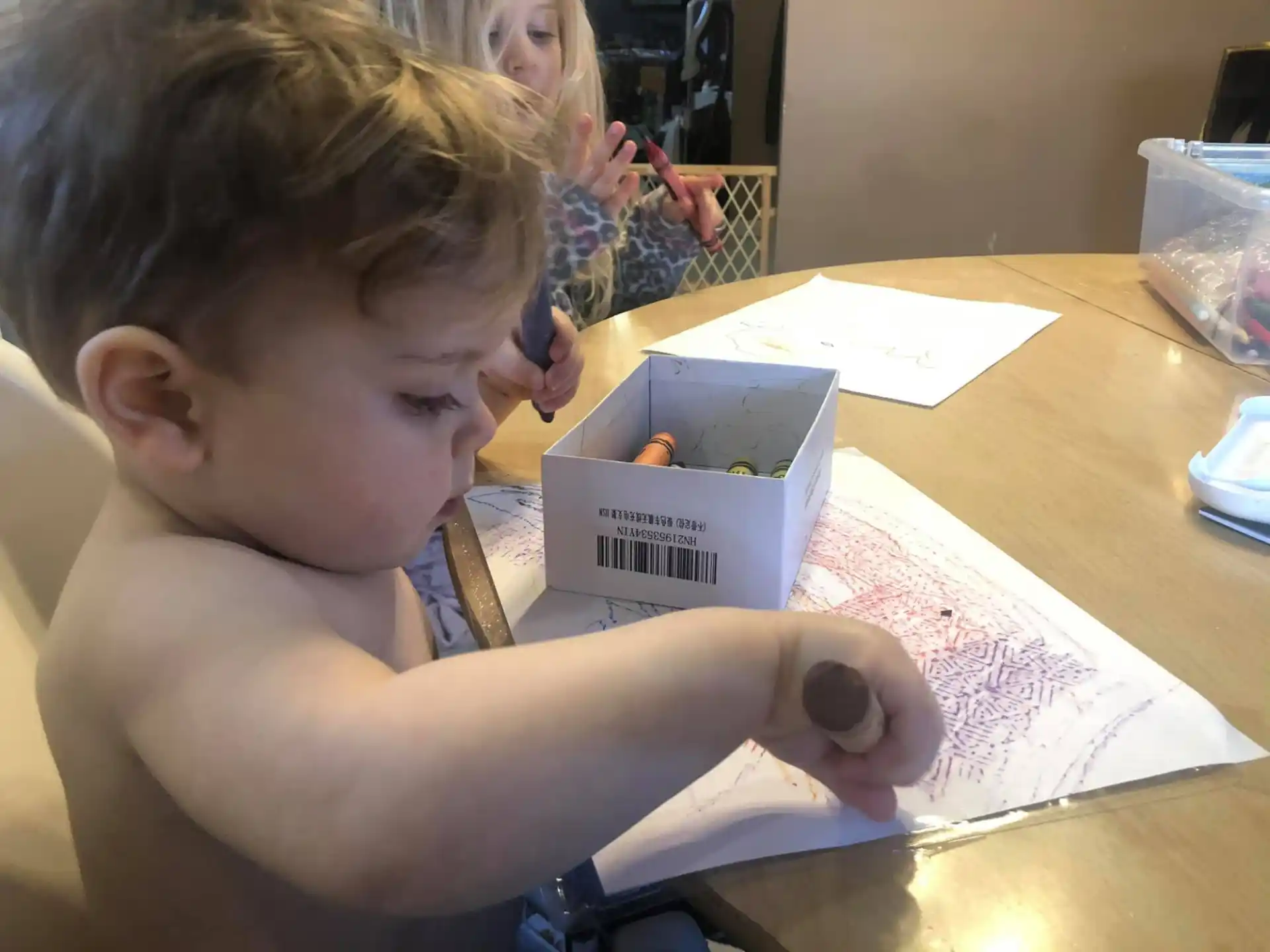 a child sitting at a table