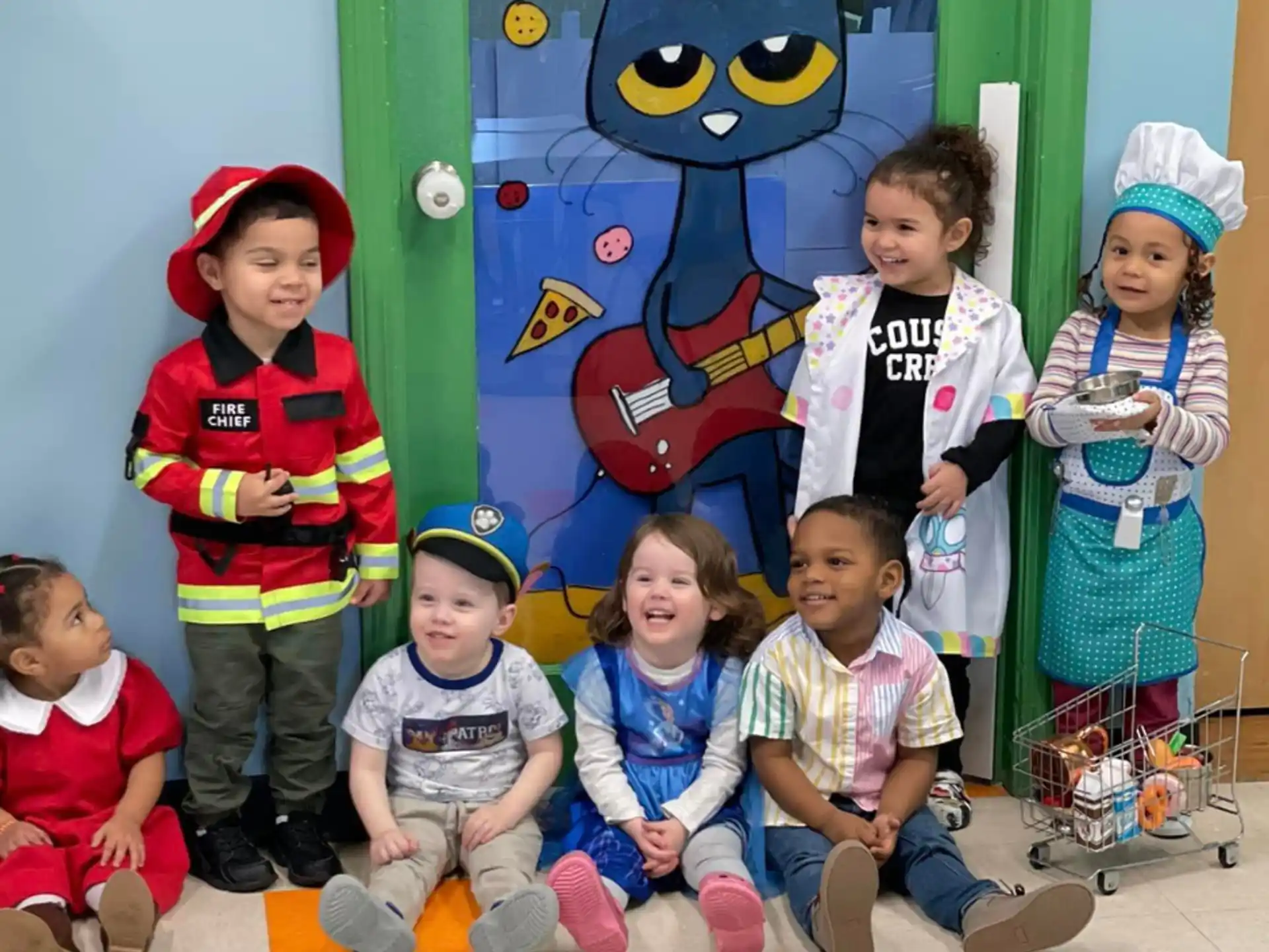 a group of children posing for a photo
