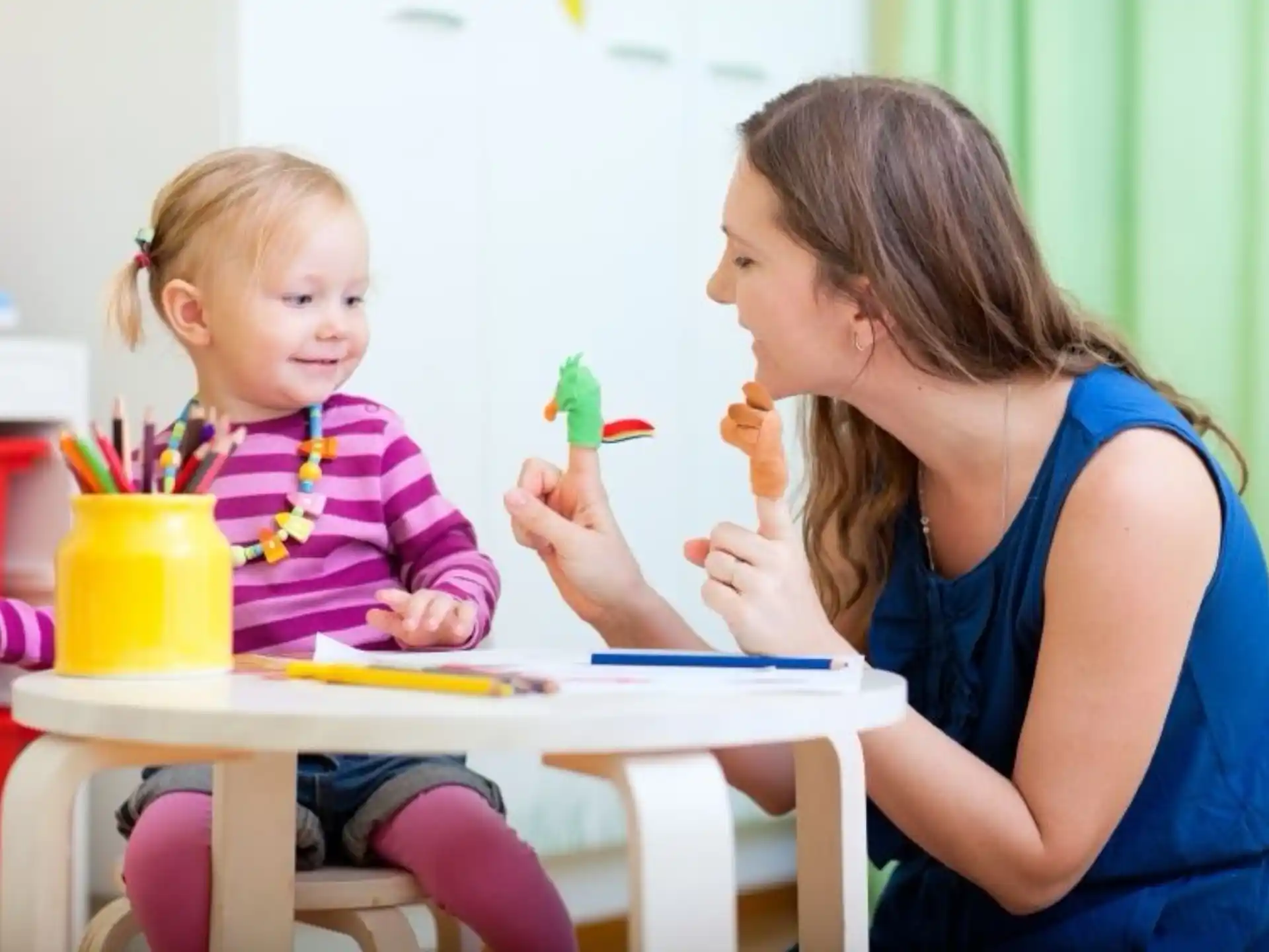 a person and a child eating