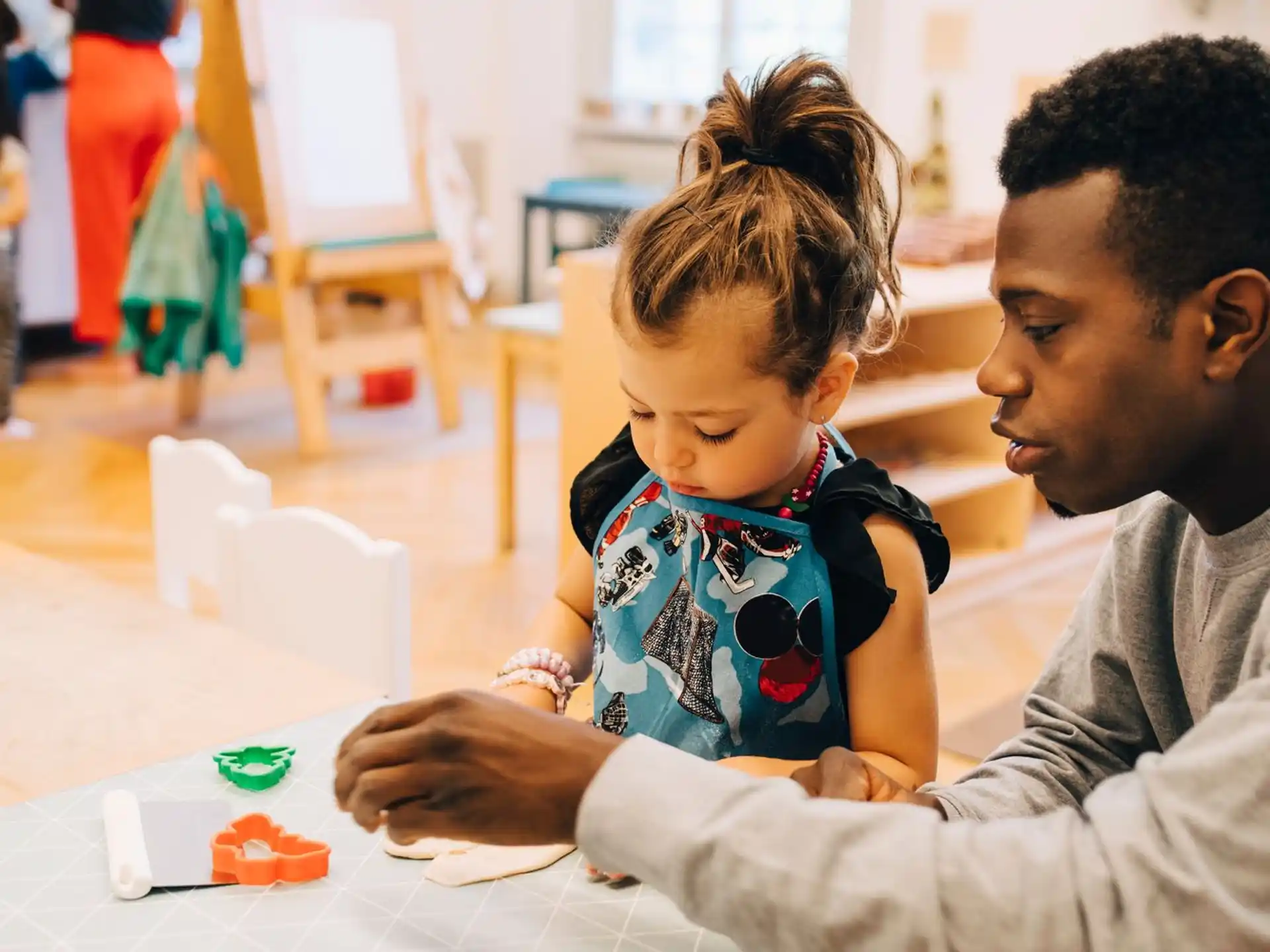 a person and a child playing a game