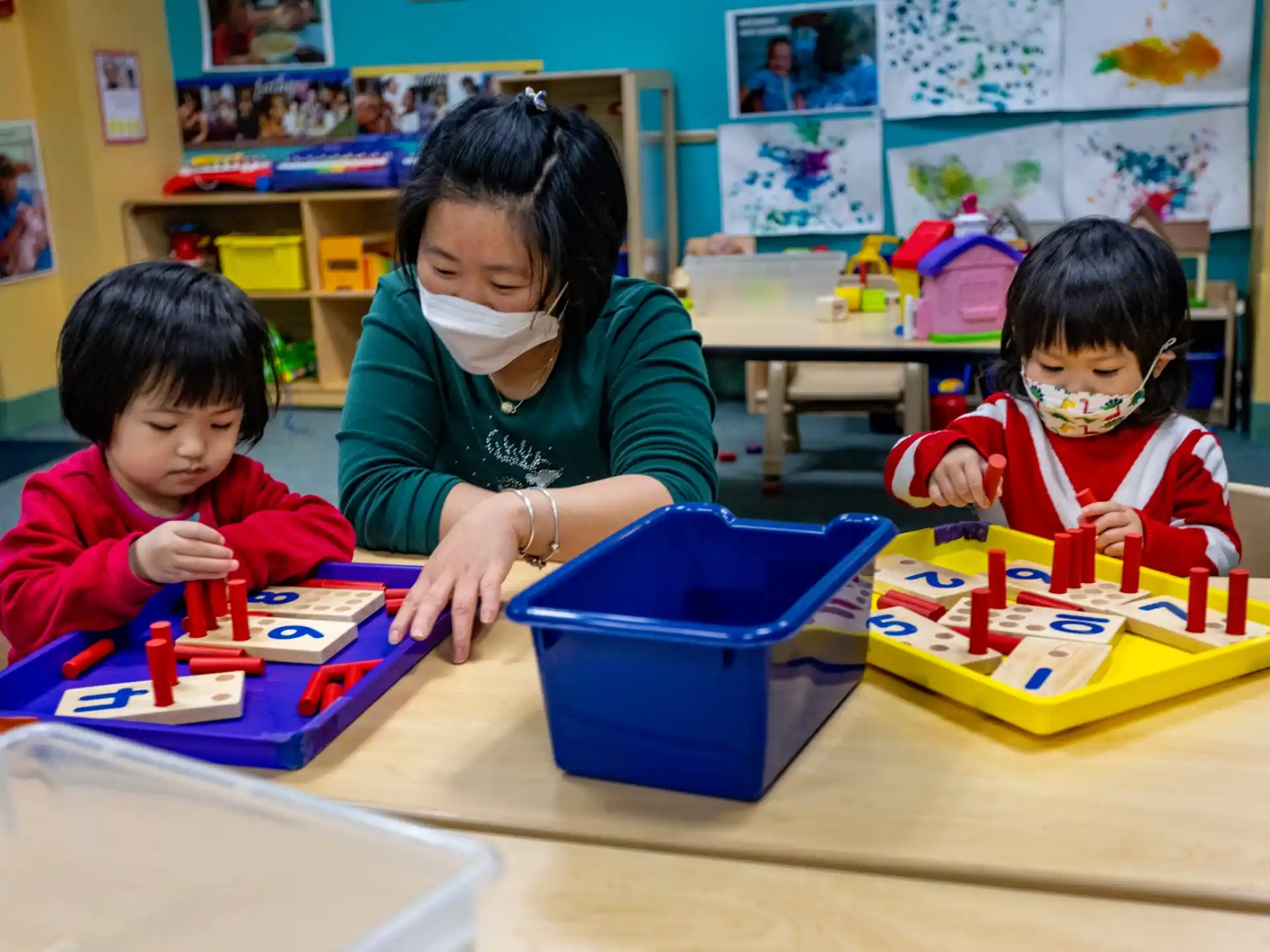 a few children playing with toys