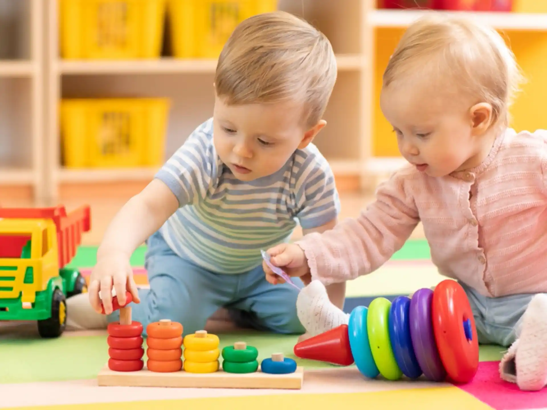 two children playing with toys