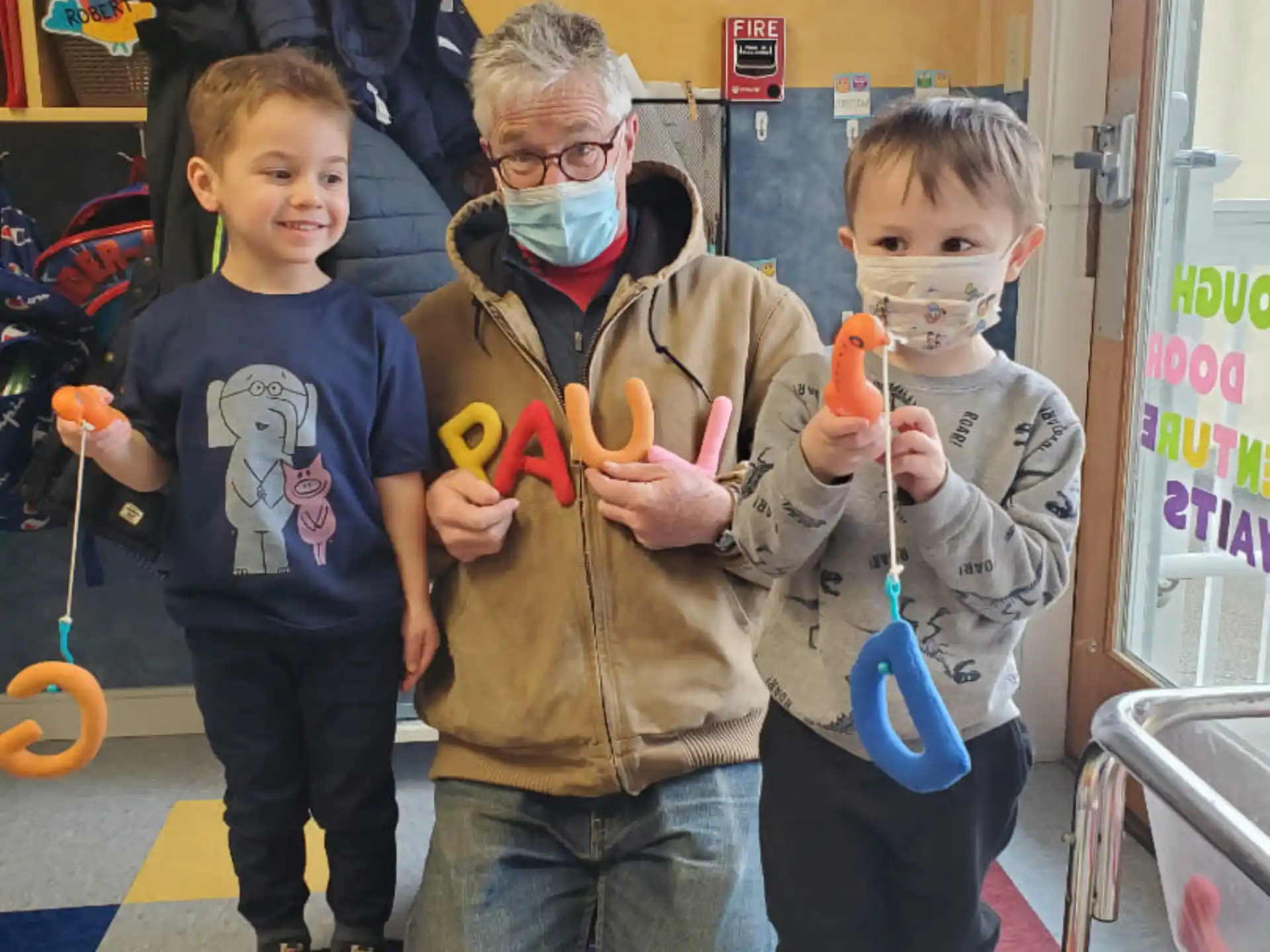a person and two boys