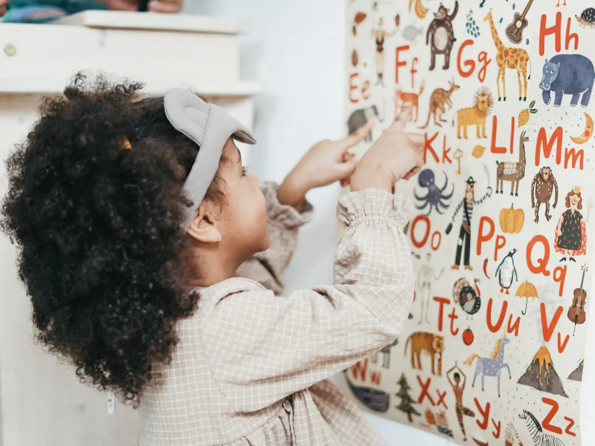 a person writing on a white board