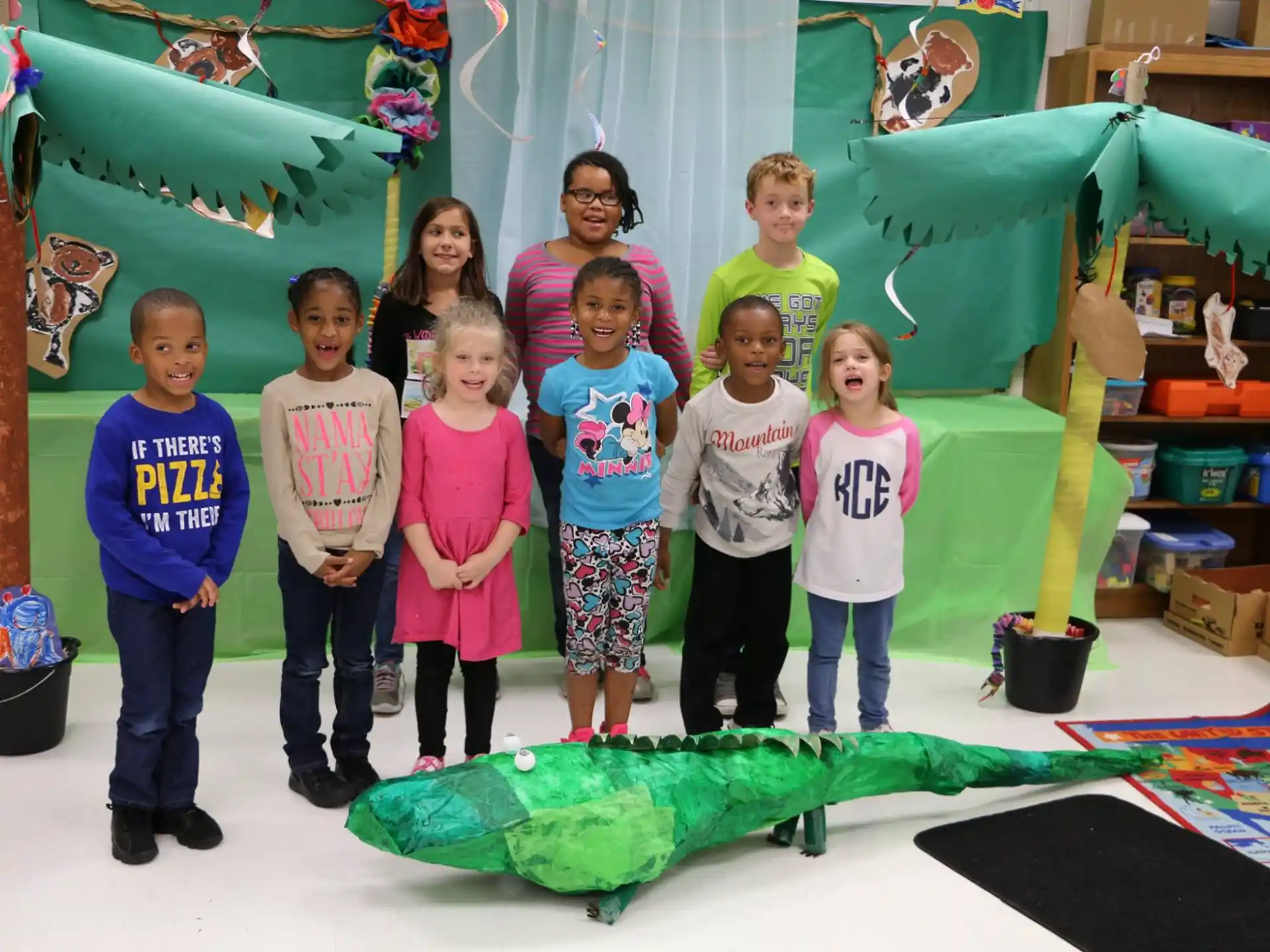 a group of children posing for a photo