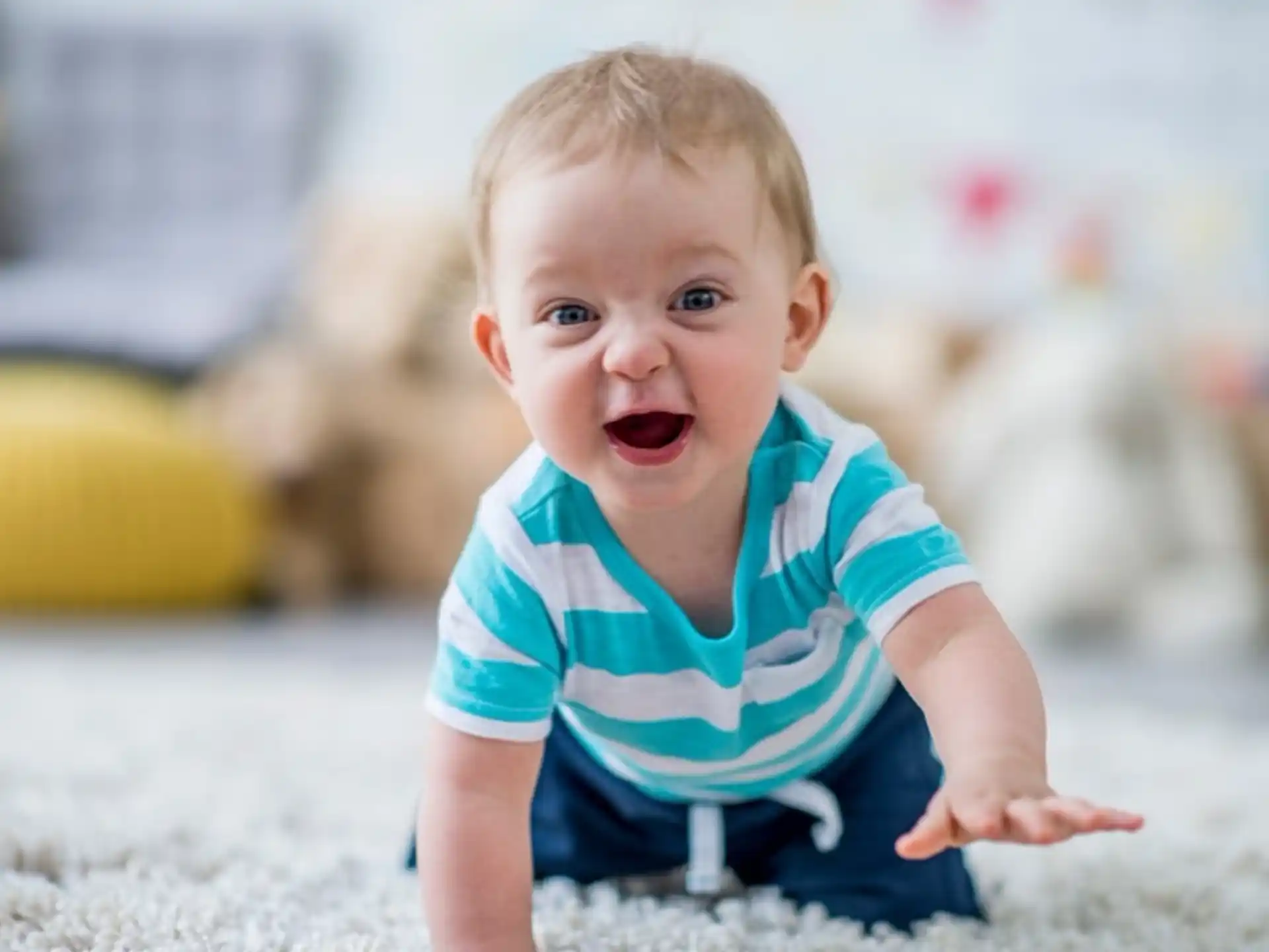 a baby crawling on the ground