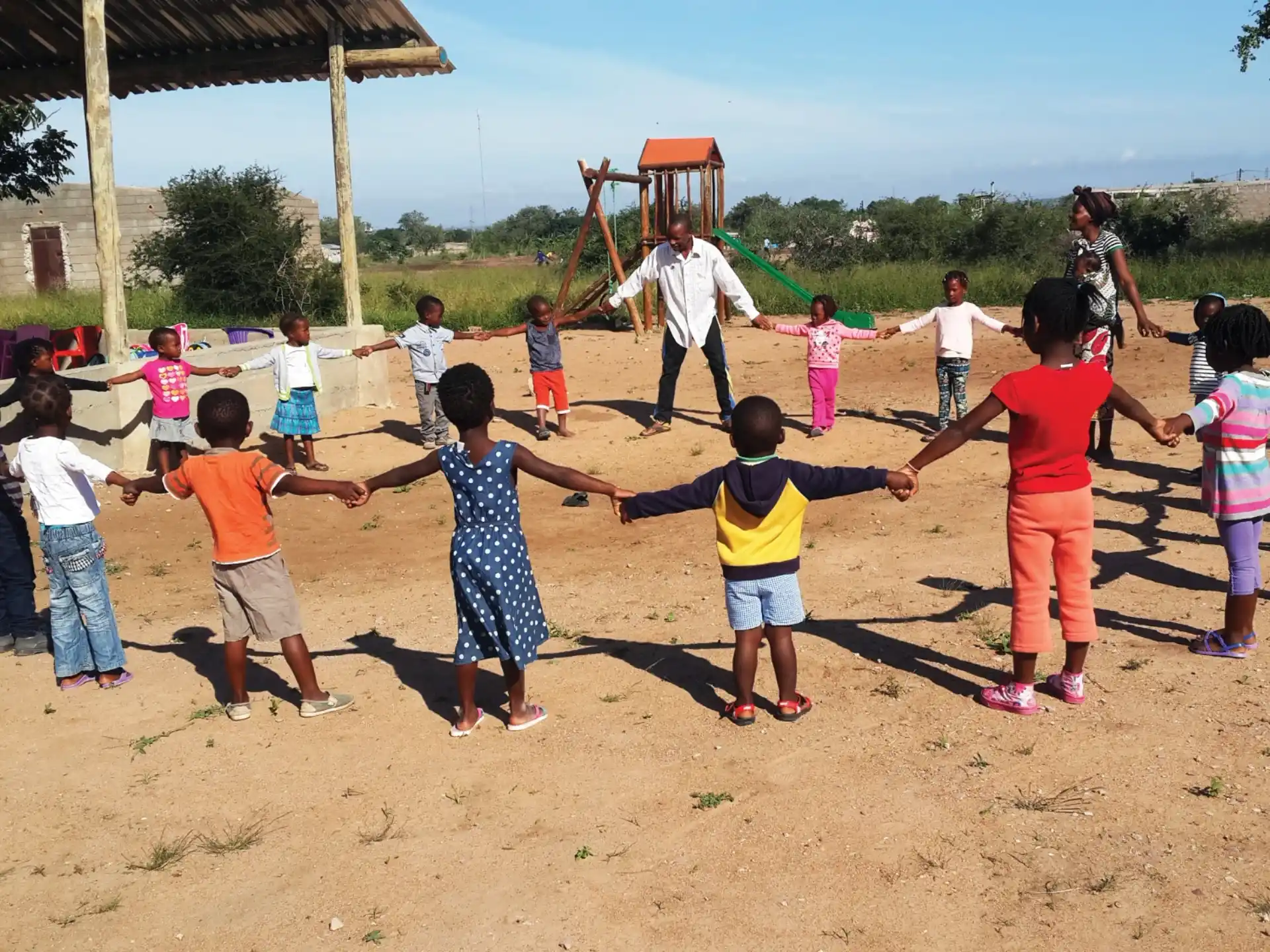 a group of children playing outside