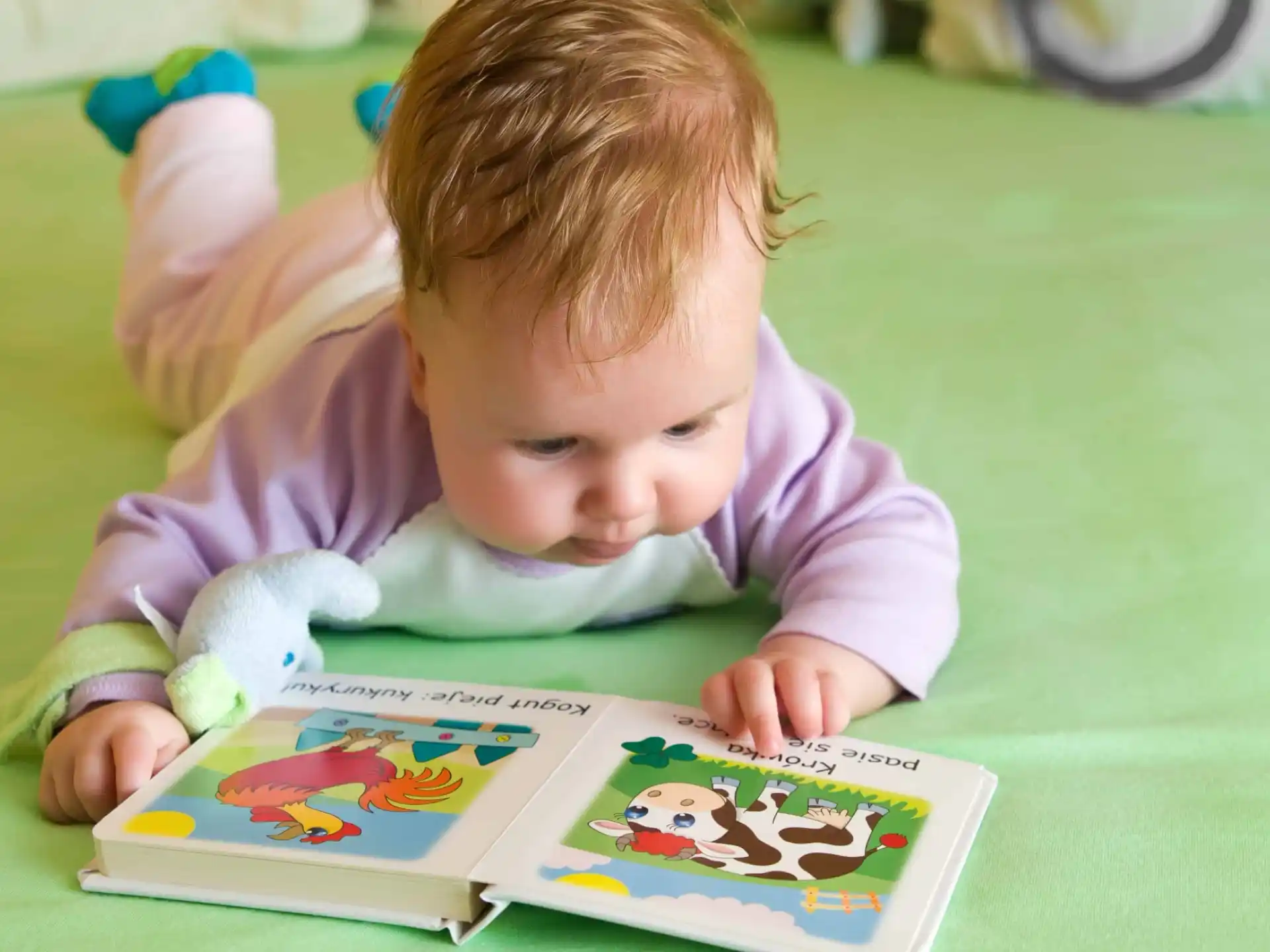 a baby playing with a toy