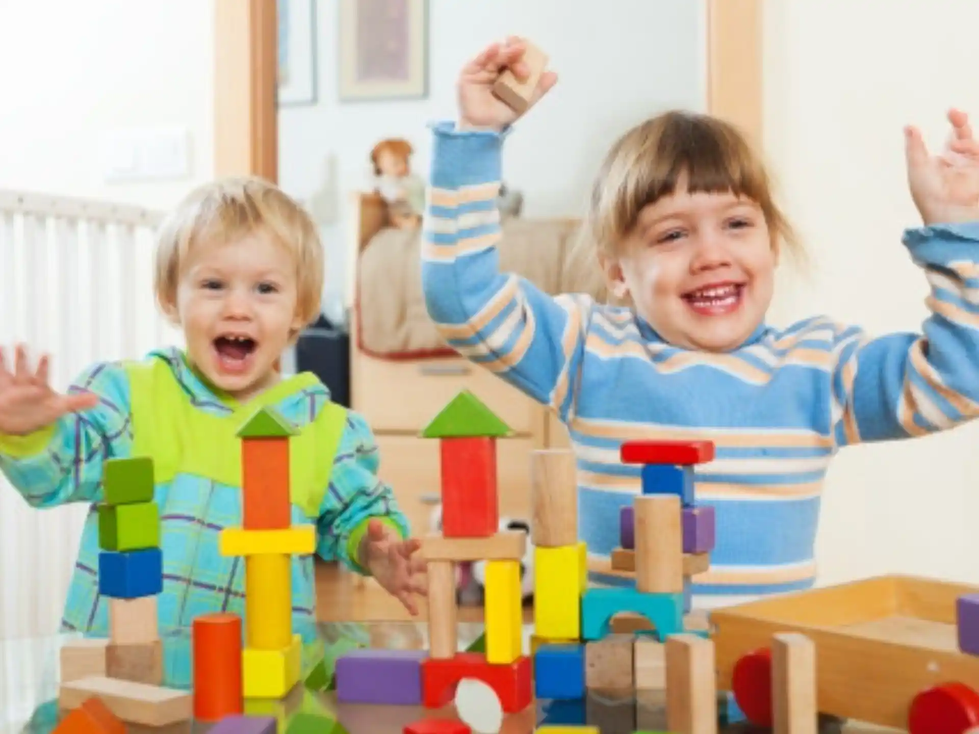 a couple of kids playing with toys