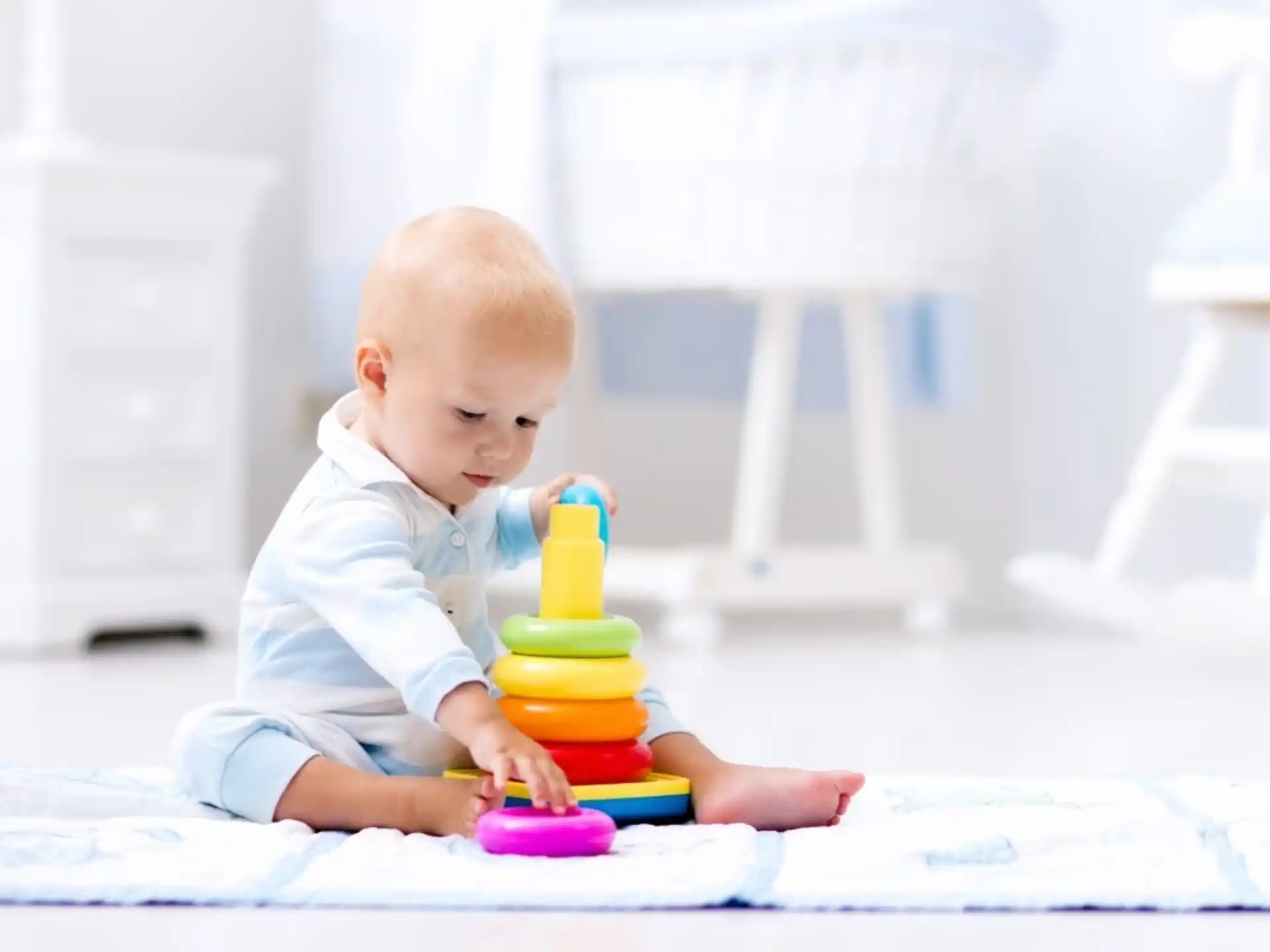 a baby playing with a toy