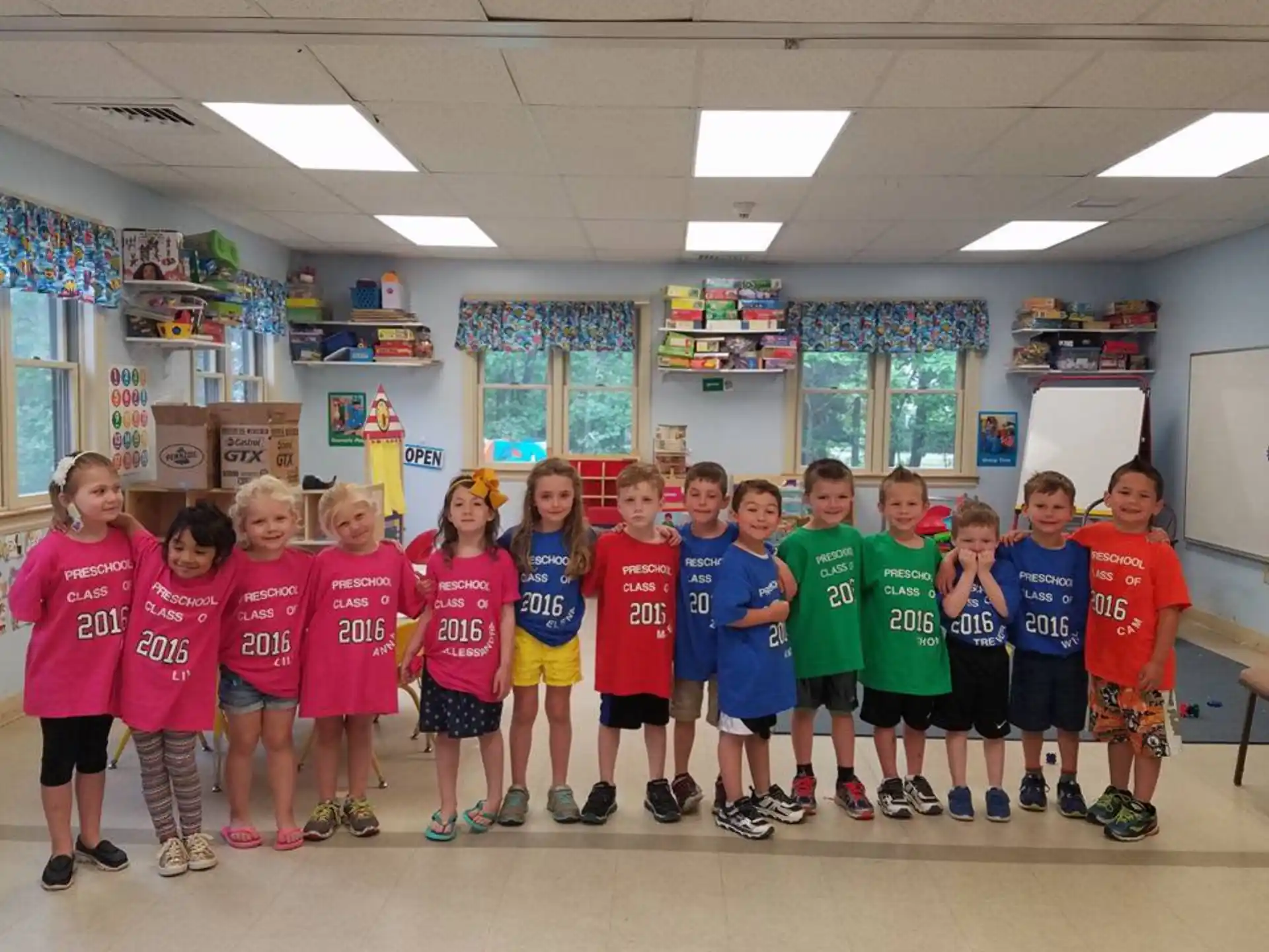 a group of children posing for a photo