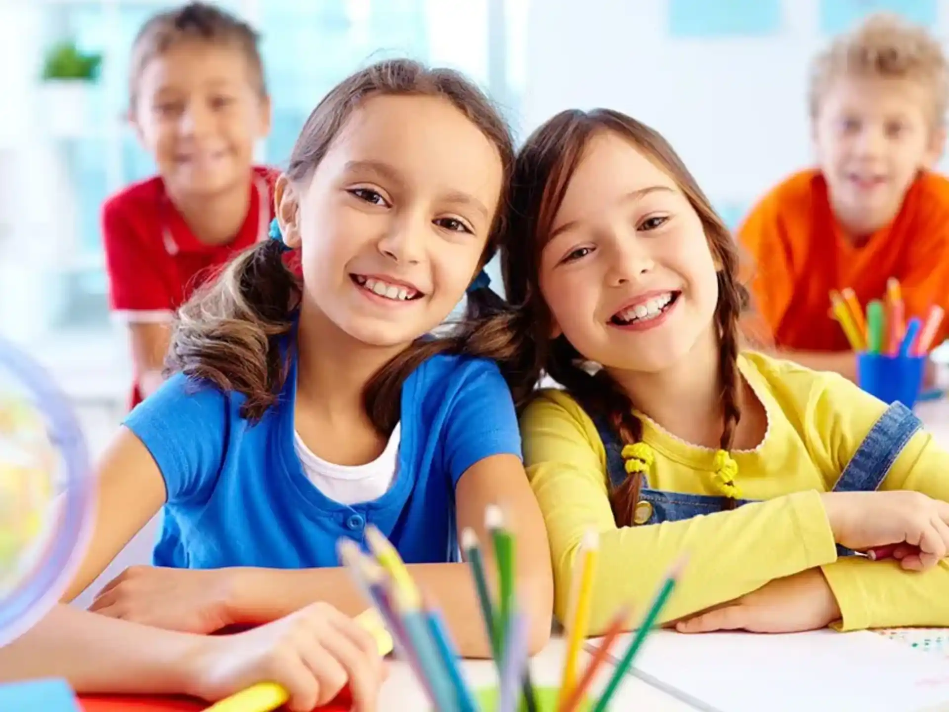 a group of children smiling