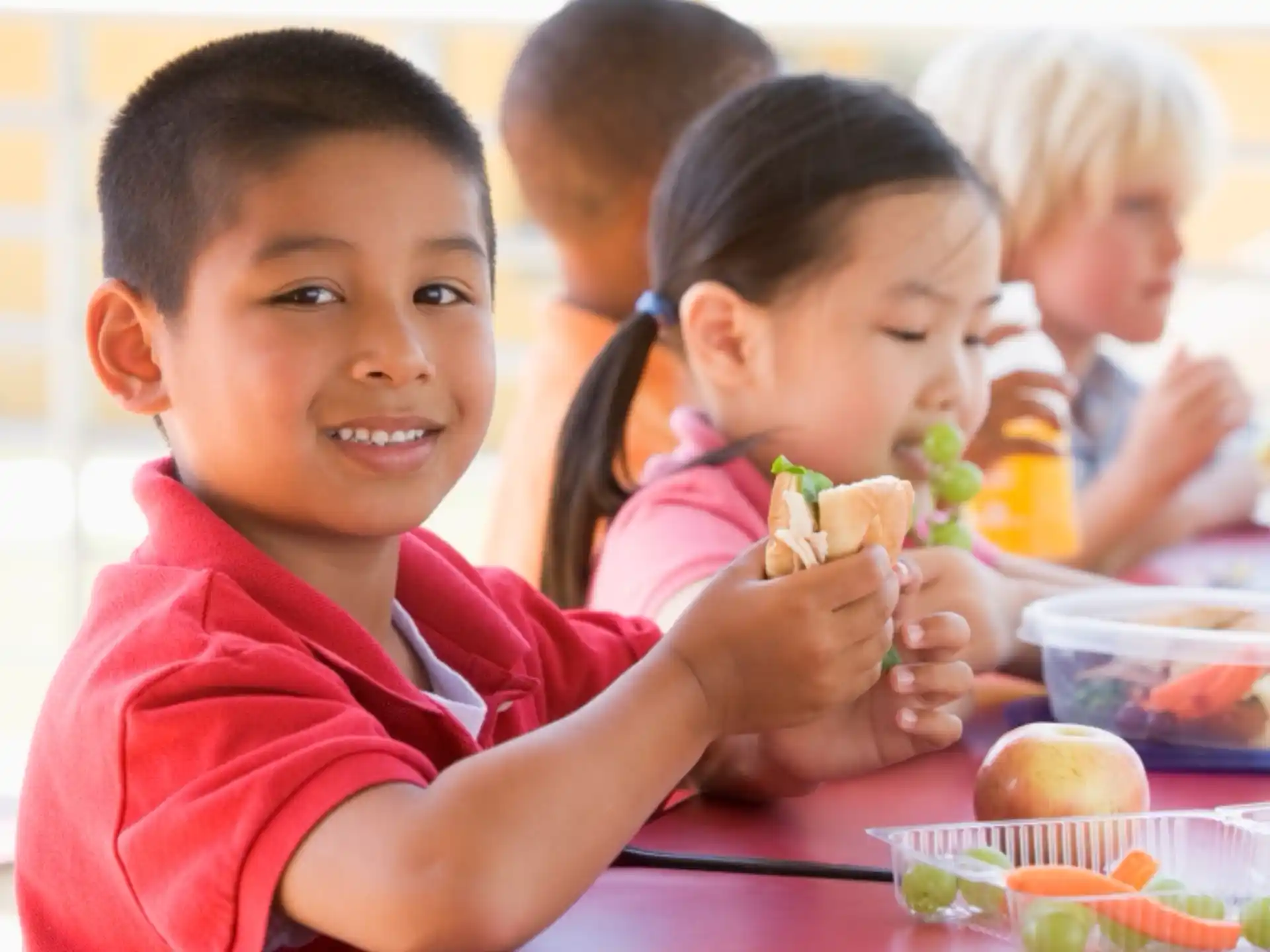 a group of children eating