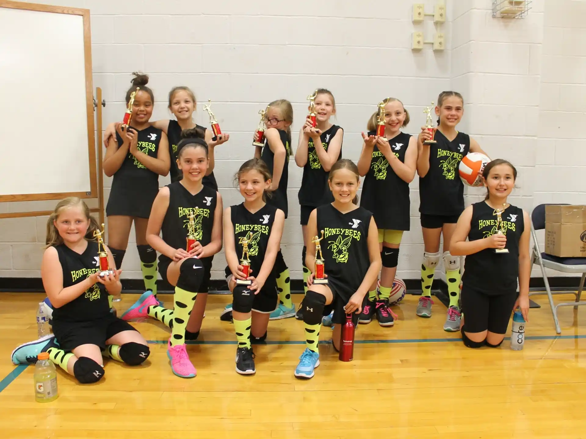 a group of girls posing for a photo