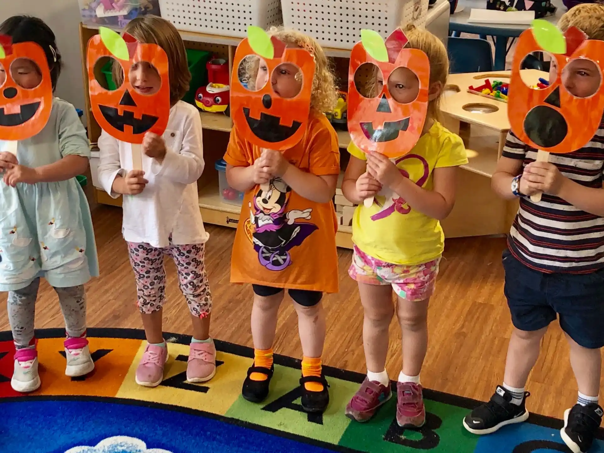 a group of children wearing clothing