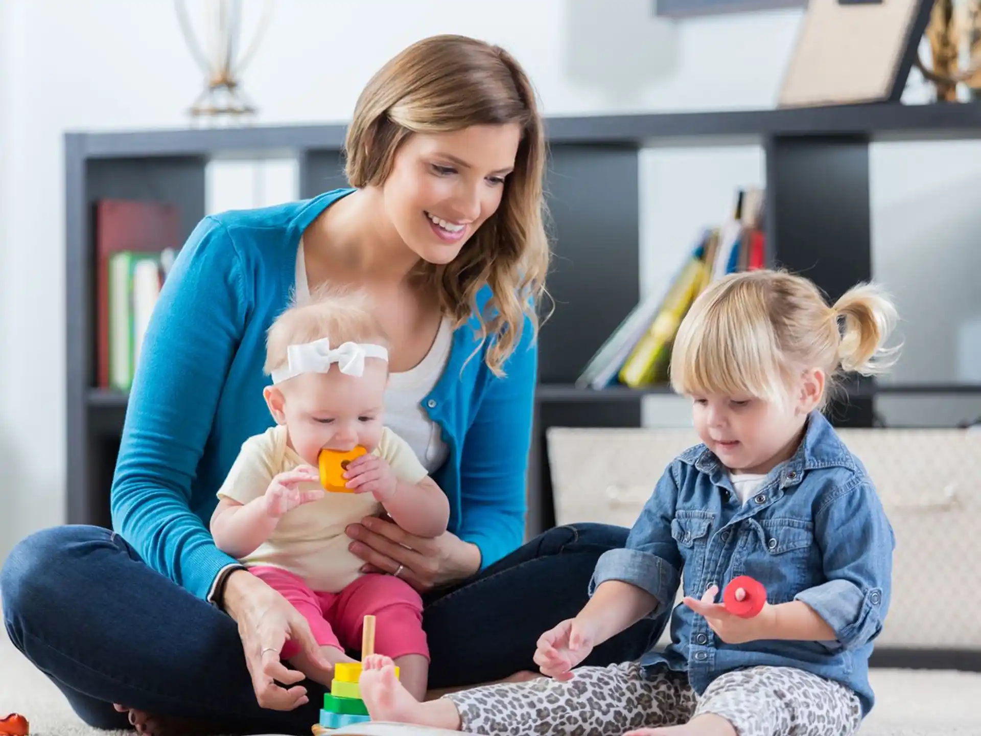 a woman and a child sitting on a couch