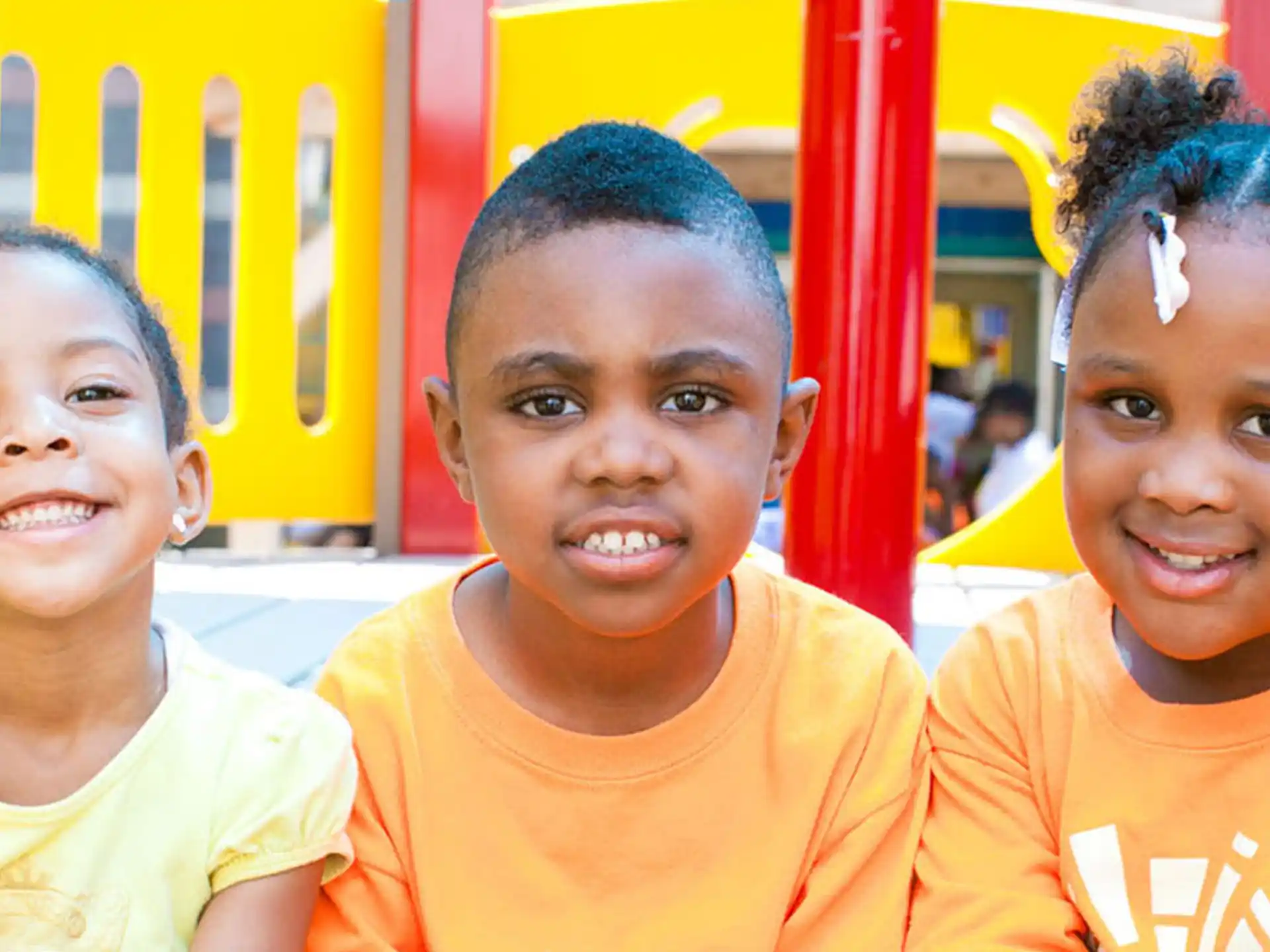 a group of children smiling