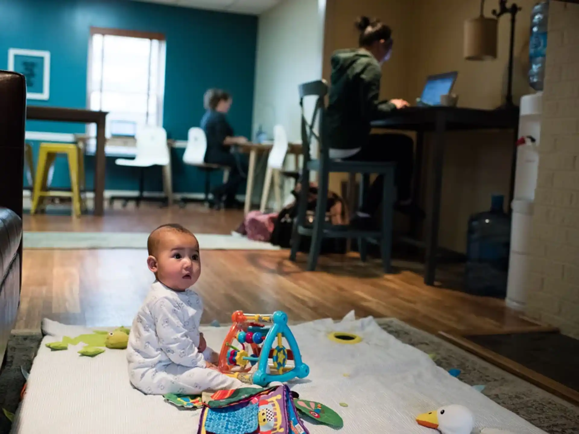 a child sitting on the floor