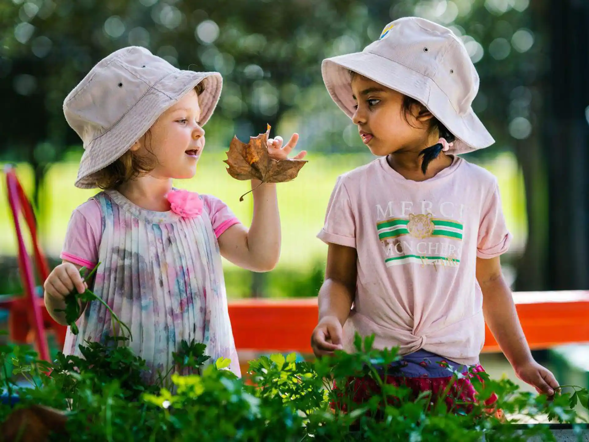 a couple of children in hats