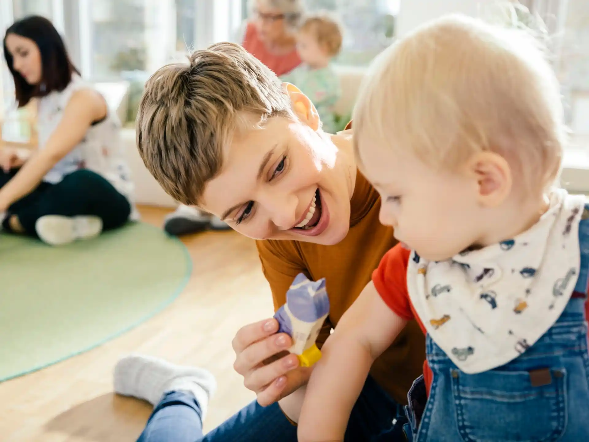 a couple of children playing with toys
