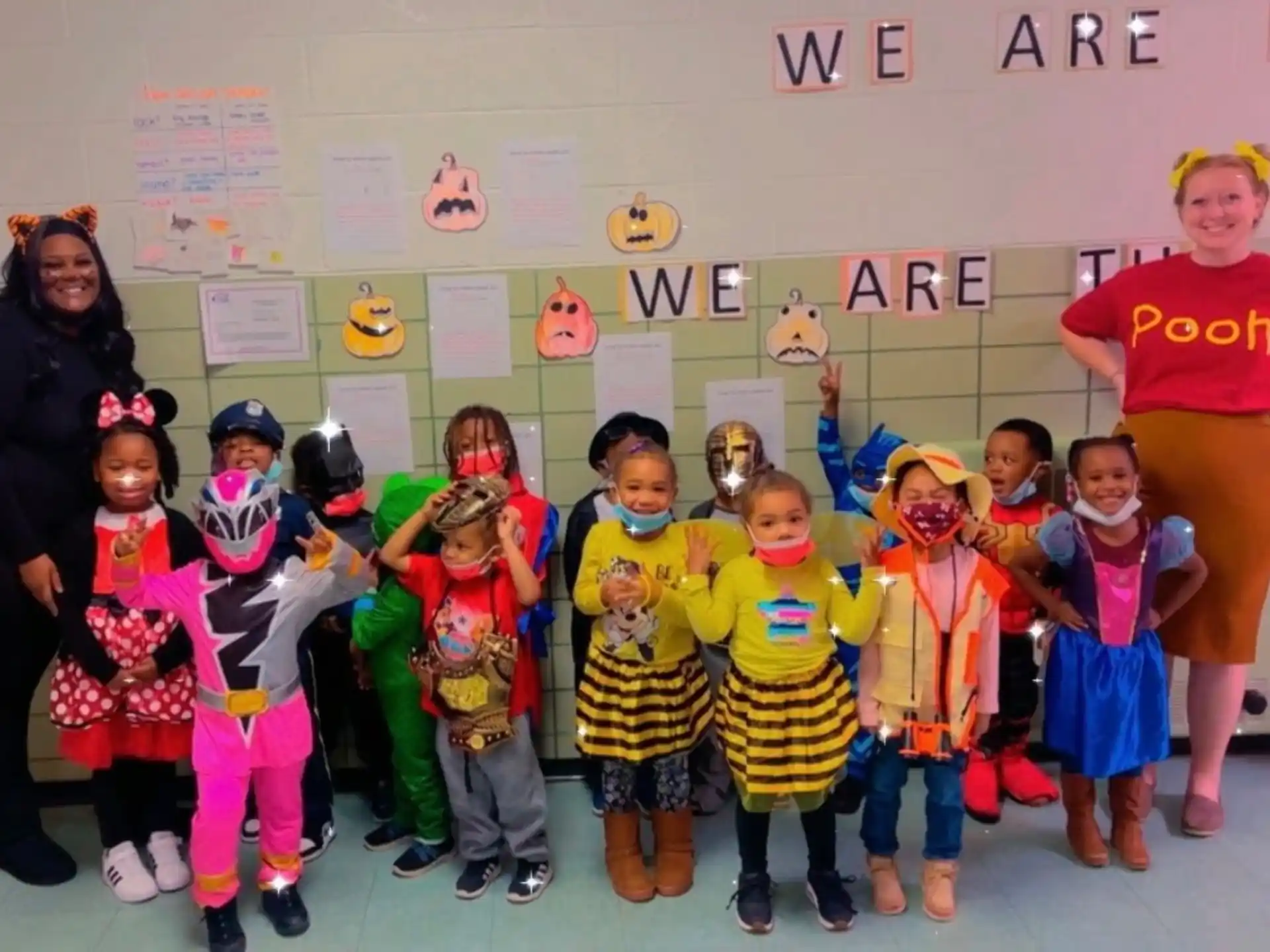 a group of children posing for a photo