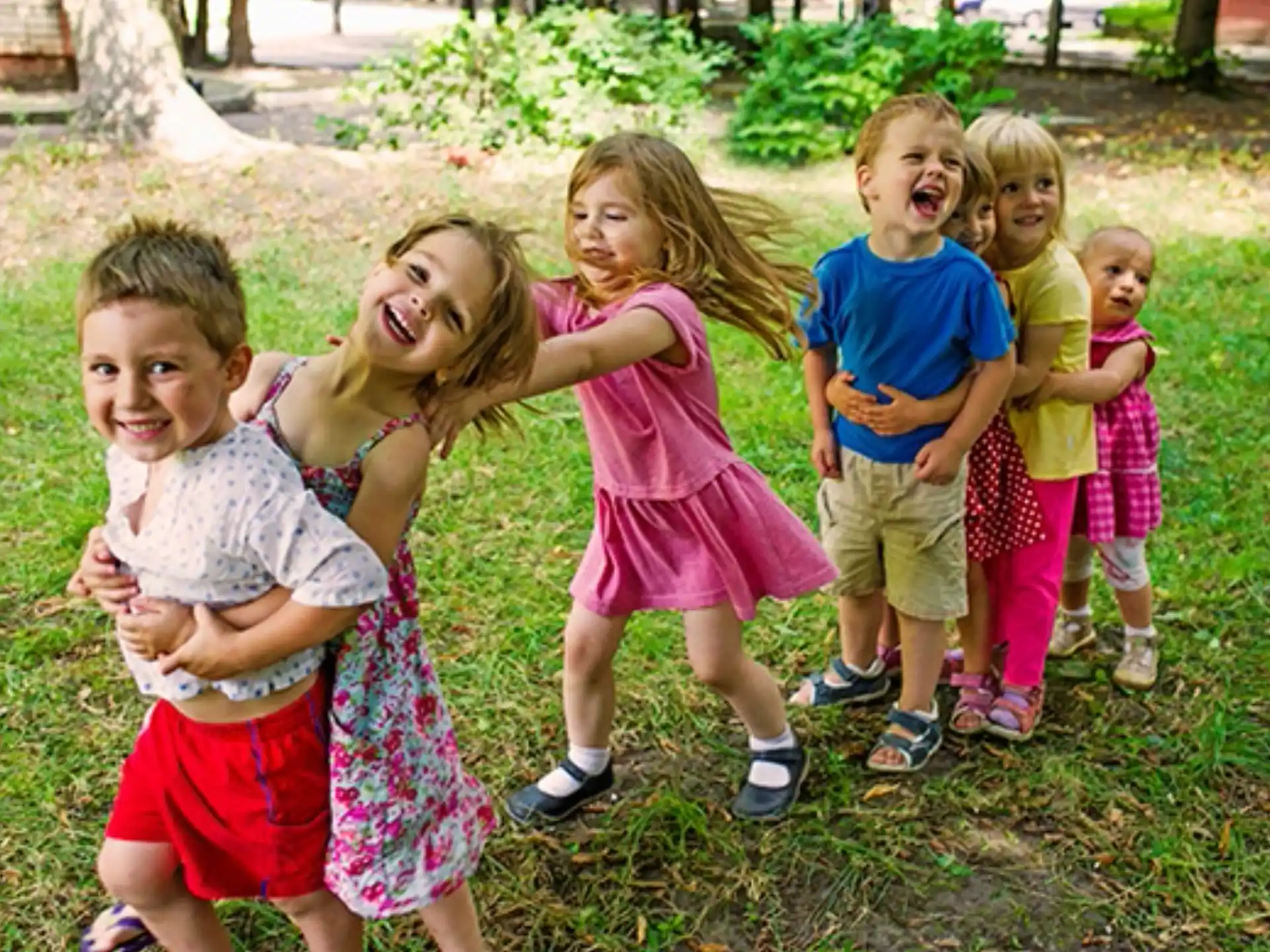 a group of children posing for a photo