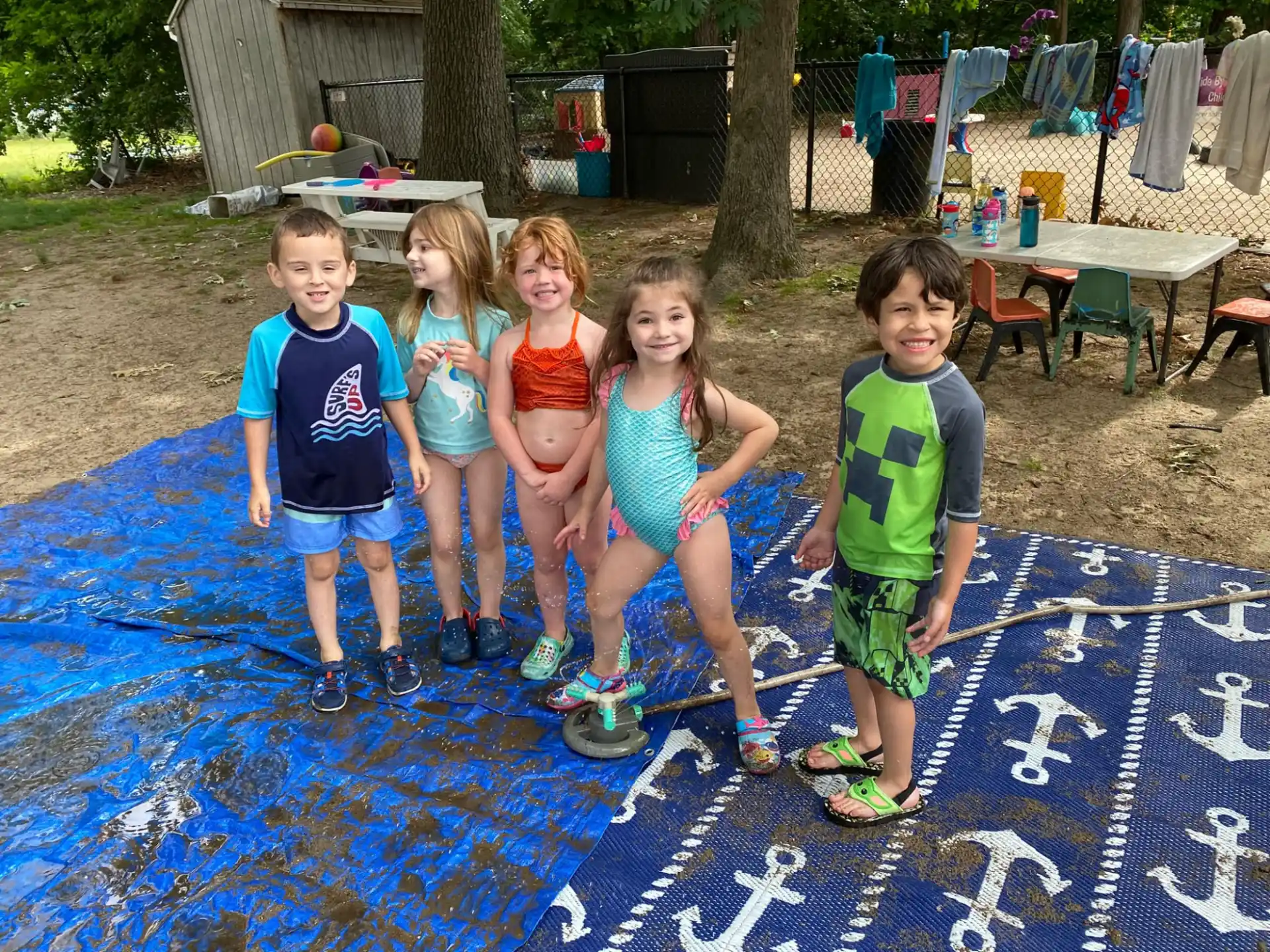 a group of children posing for a photo