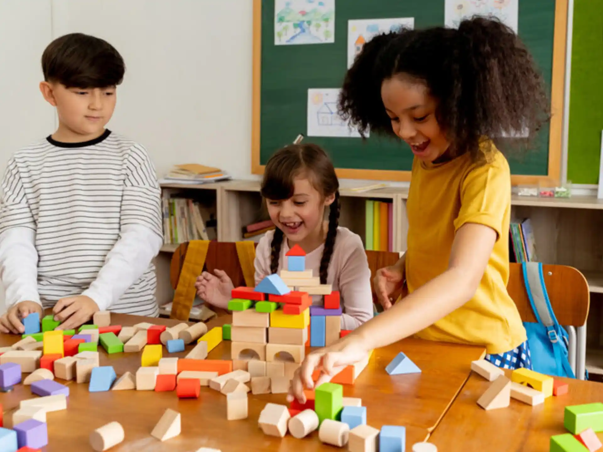 a group of children playing with blocks