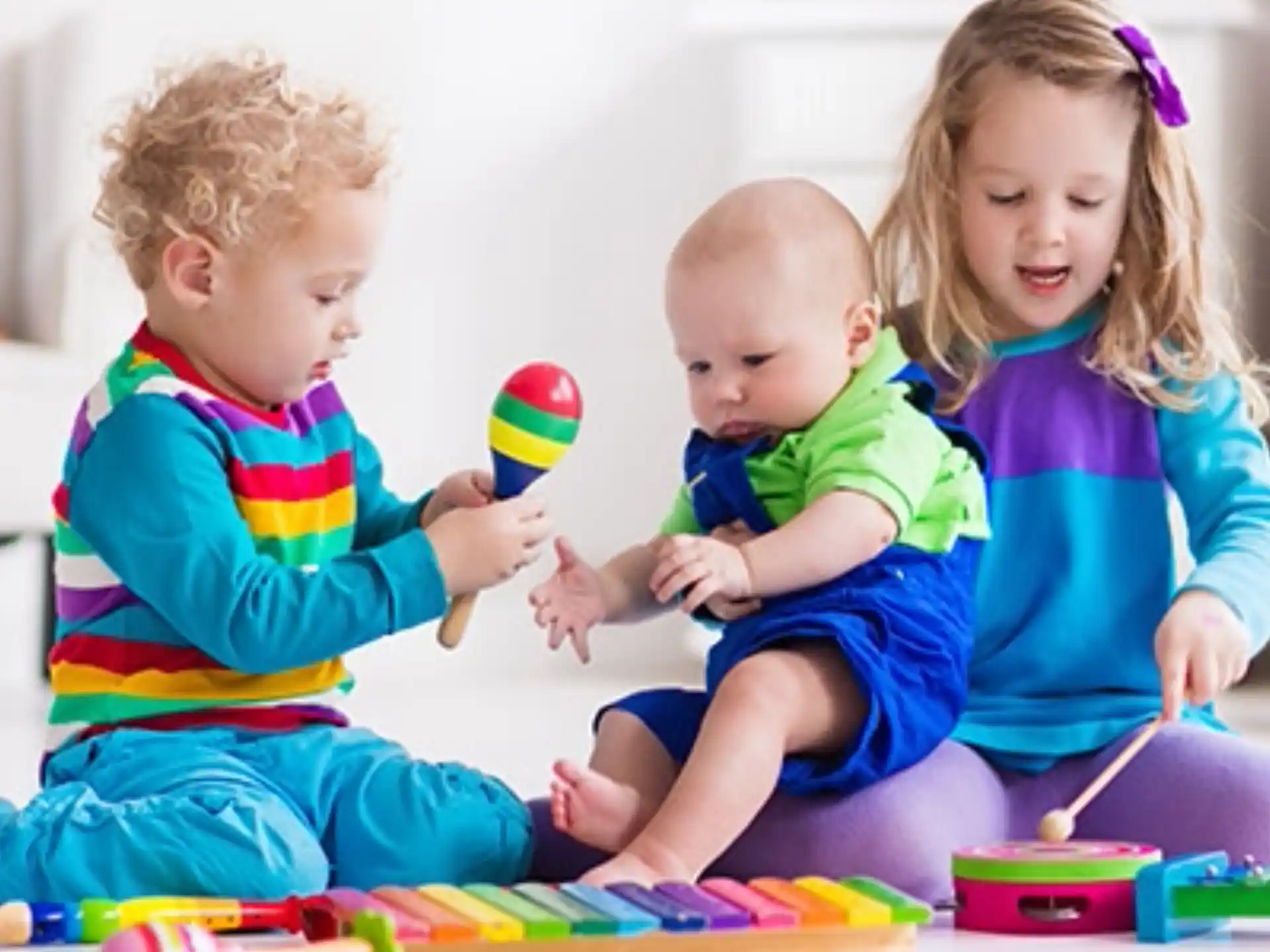 a group of children playing with toys