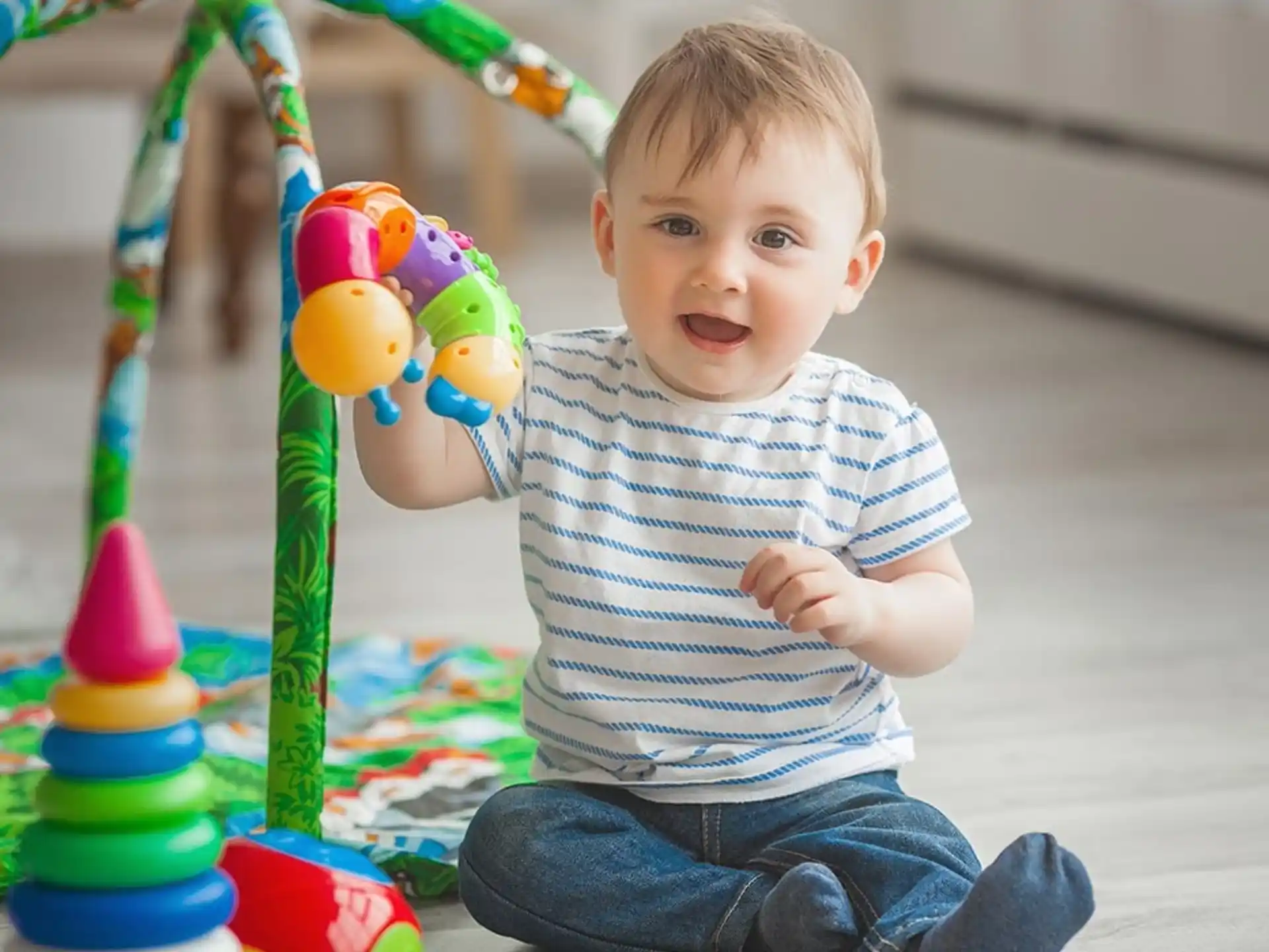 a baby playing with toys