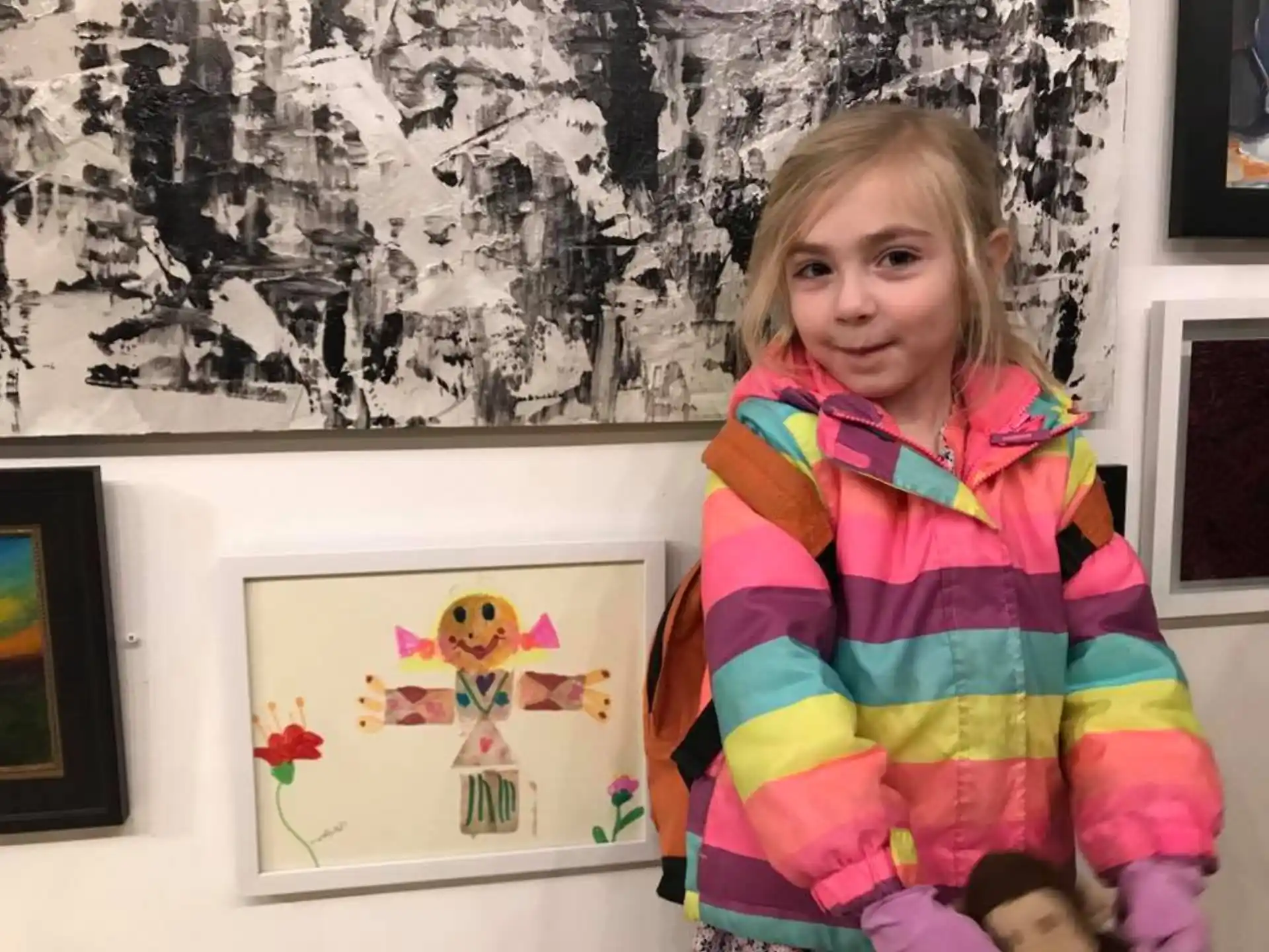 a girl holding a picture