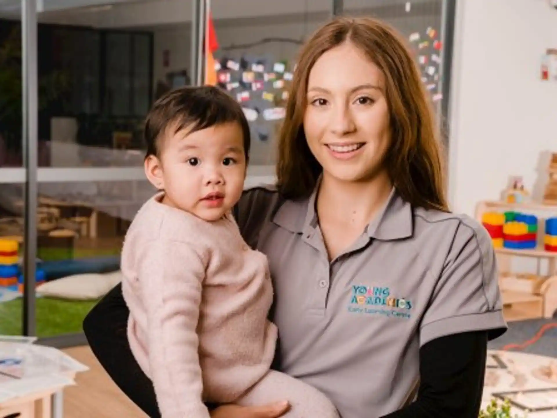a person and a child posing for the camera