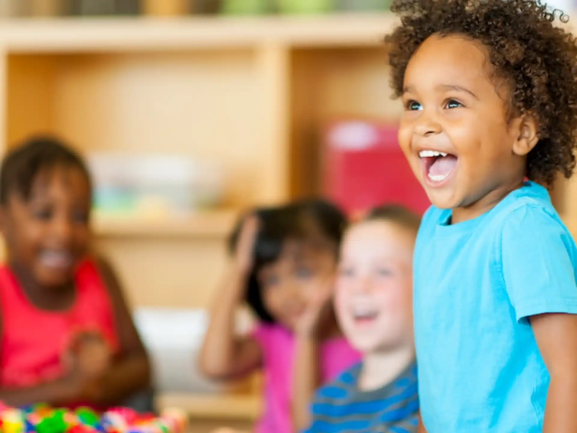 a group of children laughing